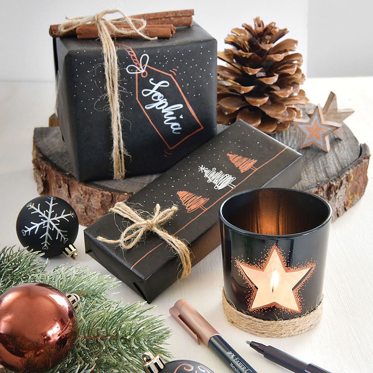 Faber-Castell Metallic Markers (used on black wrapping paper and a glass candle jar)