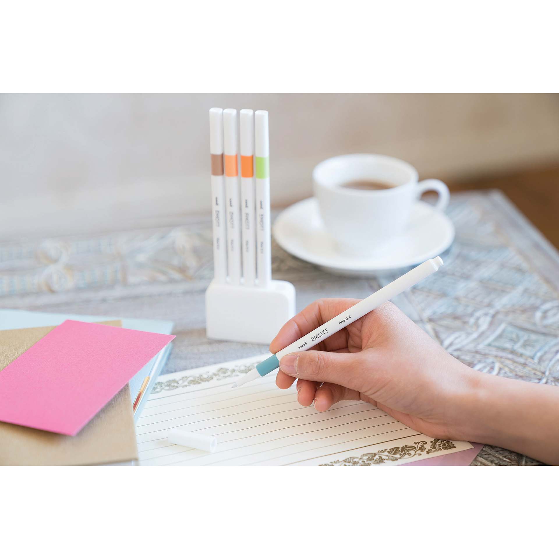 Uni Emott Fineliners - Set of 5, Nature Colors (someone using a pen) Uni Emott Fineliners - Set of 5, Nature Colors (someone using a pen)