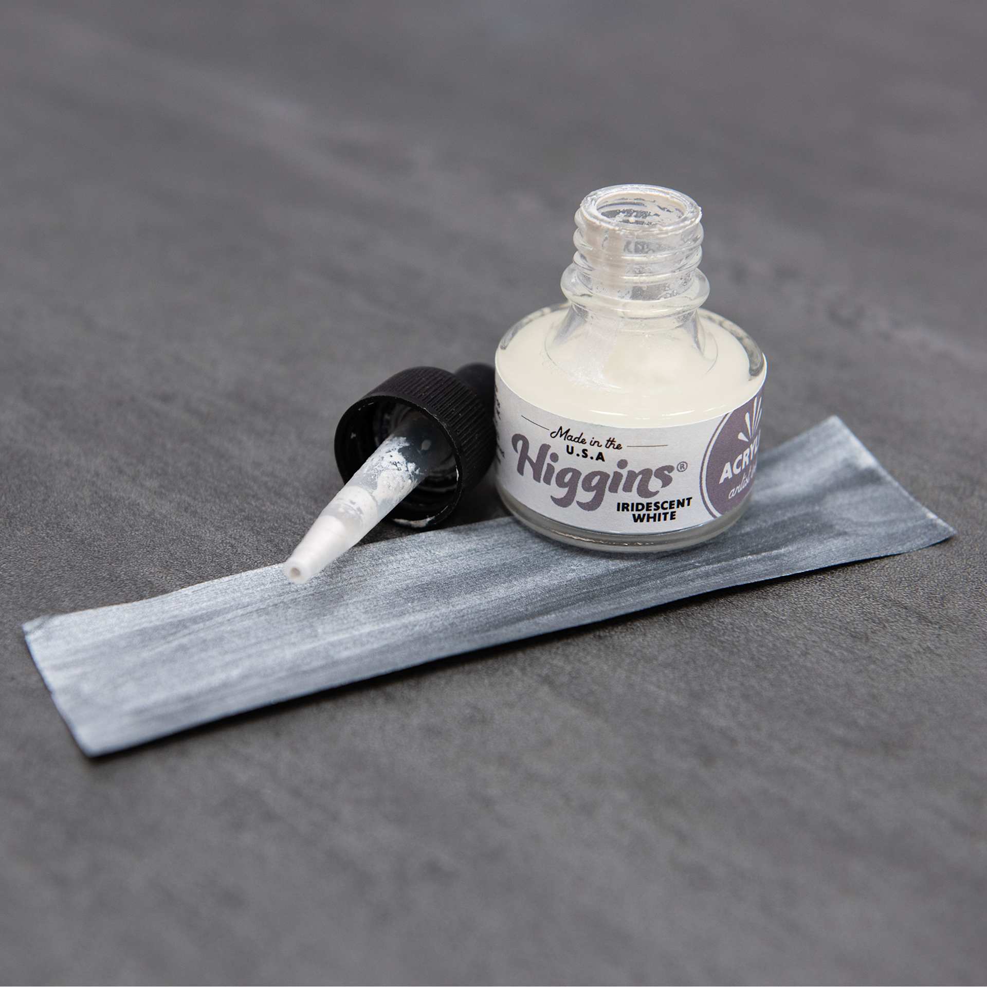 Higgins Acrylic Ink - Iridescent White, 1 oz bottle with dropper and swatch over black paper
