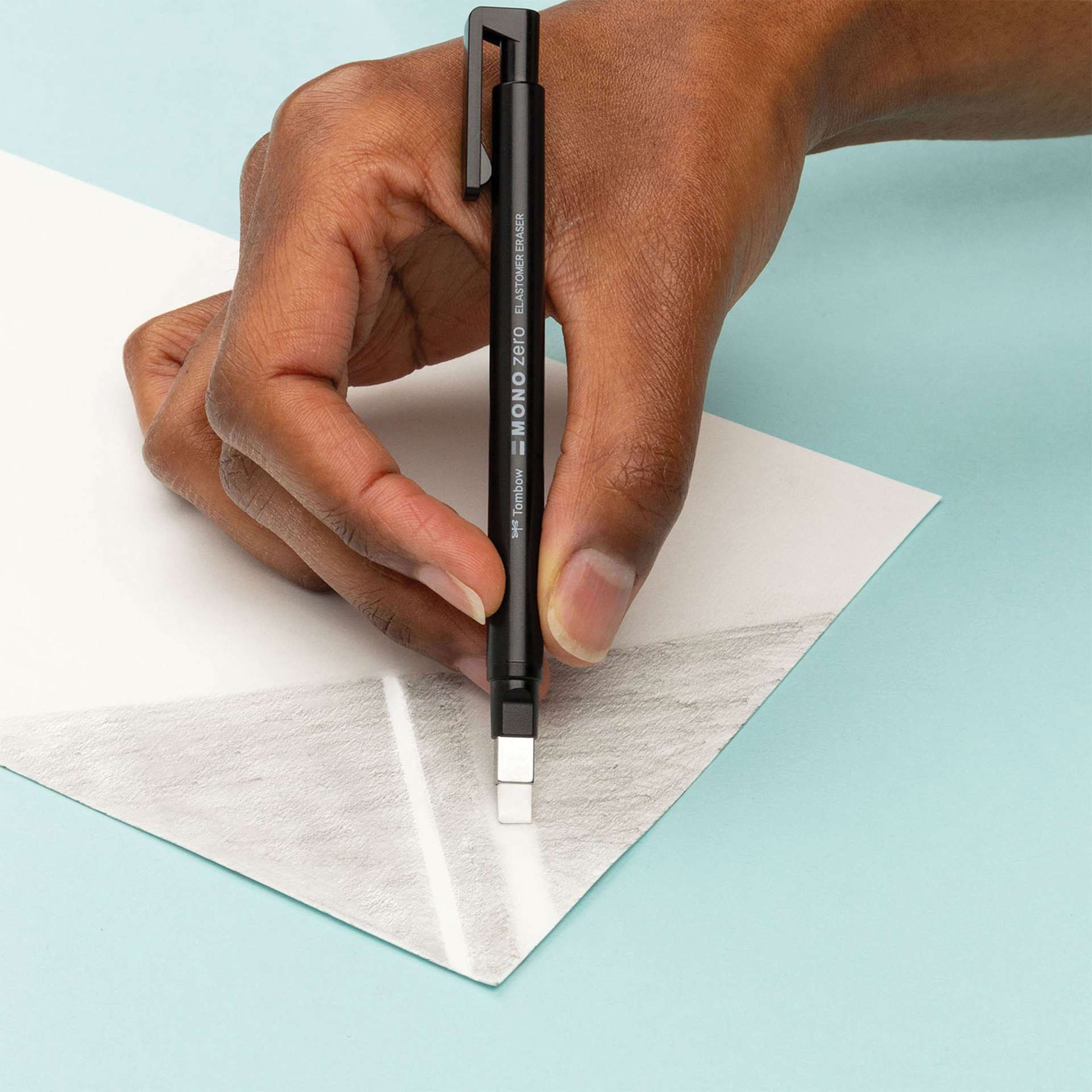 Tombow Mono Eraser Variety Pack - Set of 4, Mono Zero eraser in hand demonstrating usage Tombow Mono Eraser Variety Pack - Set of 4, Mono Zero eraser in hand demonstrating usage
