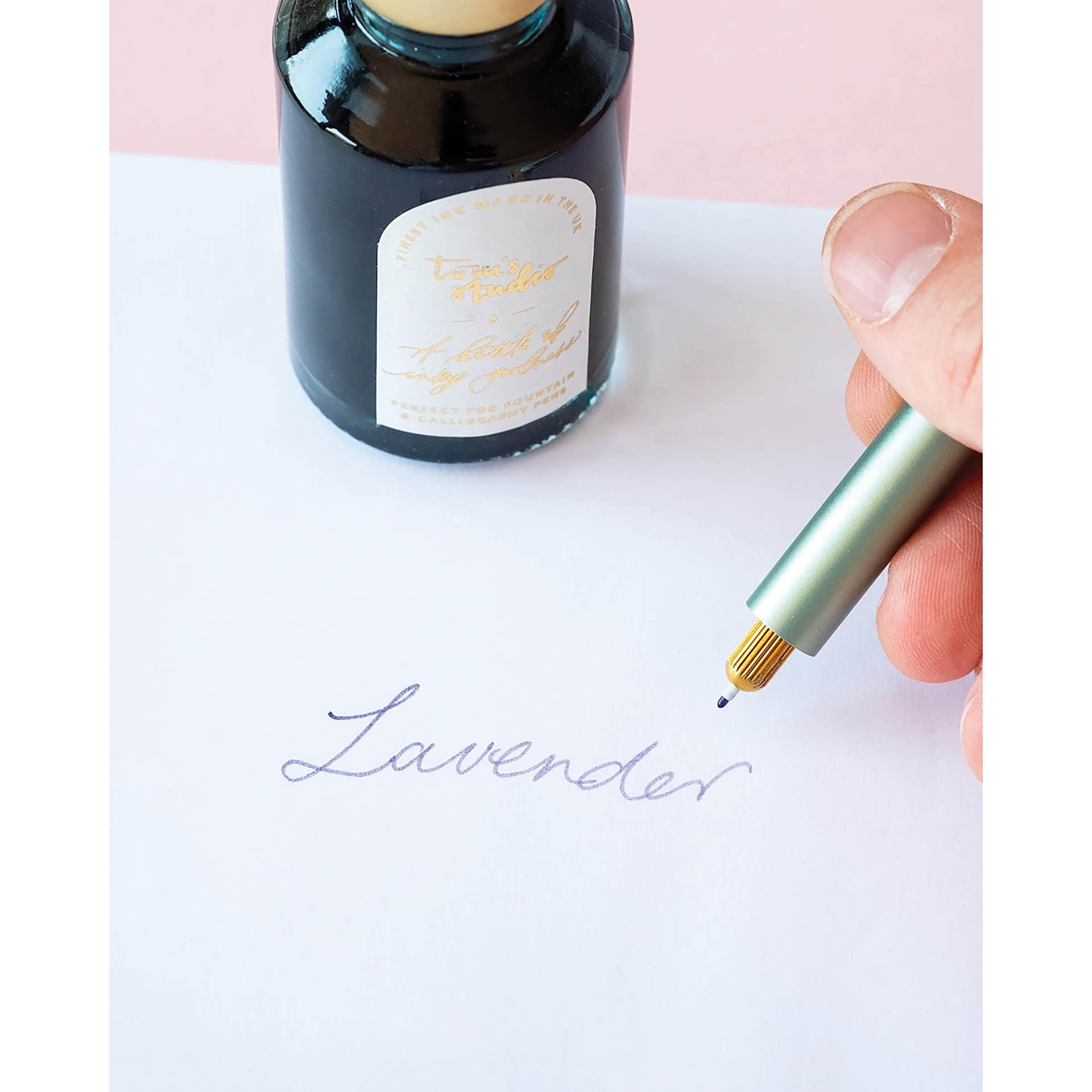 Tom's Studio Lumos Mini Refillable Pen - Sage, pen in hand writing
