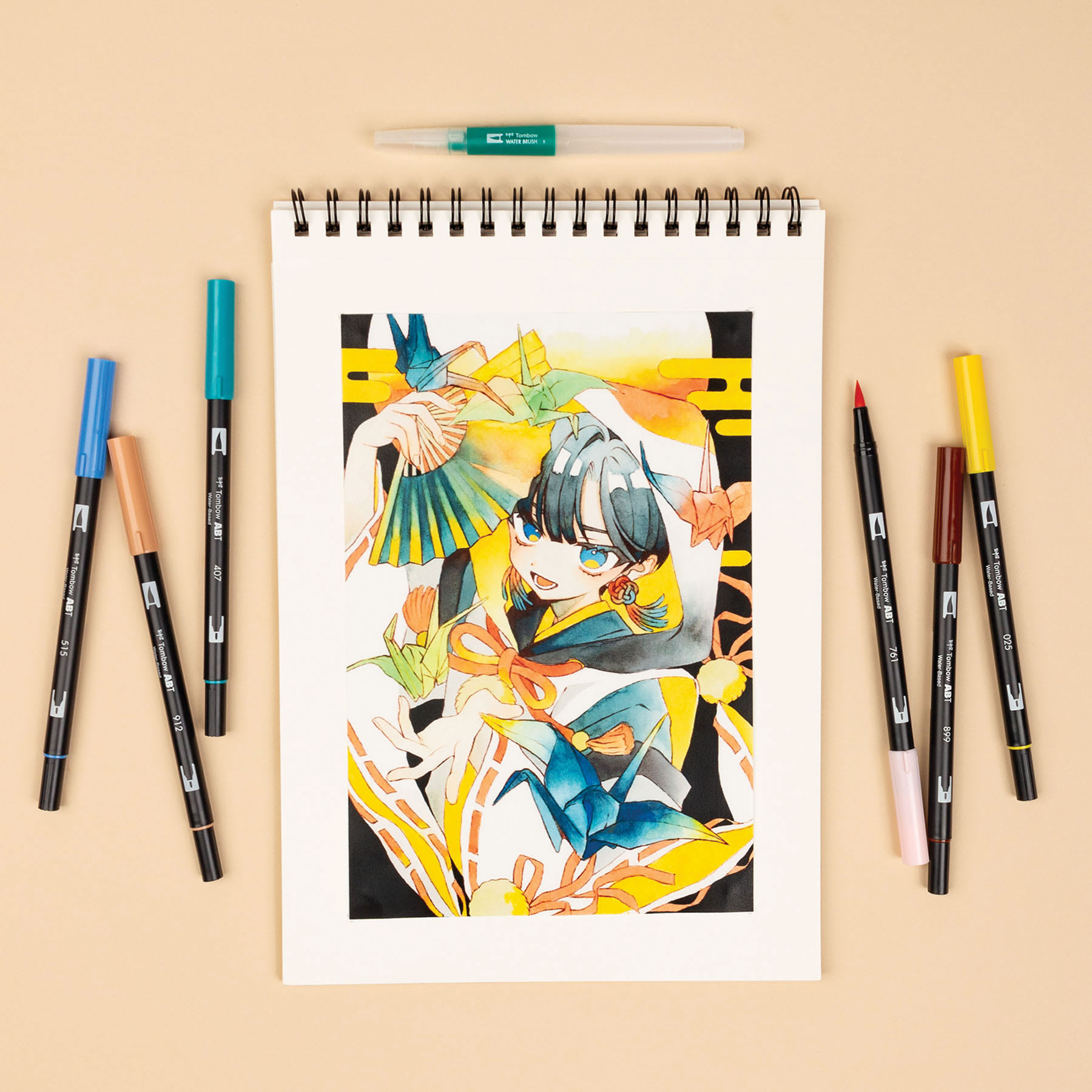 Tombow Dual Brush Manga Illustration Pens - Bird, Kit of 10, artwork and pens laid out