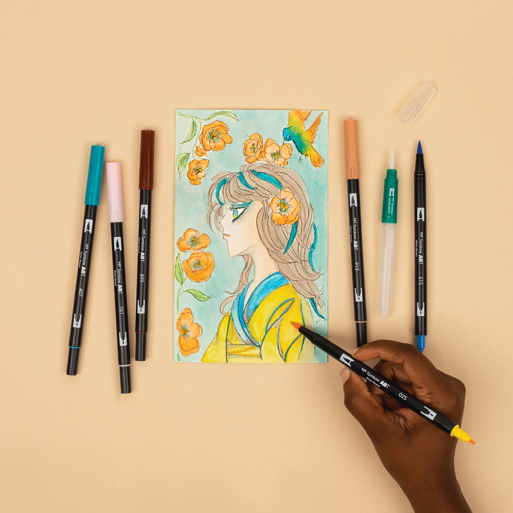 Tombow Dual Brush Manga Illustration Pens - Bird, Kit of 10, pen marker in hand