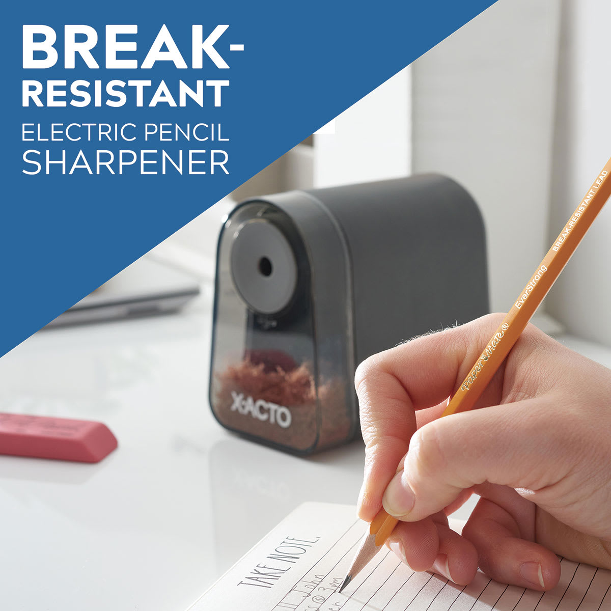 Mighty Mite Electric Pencil Sharpener with Pencil Saver - Hand writing with pencil next to sharpener