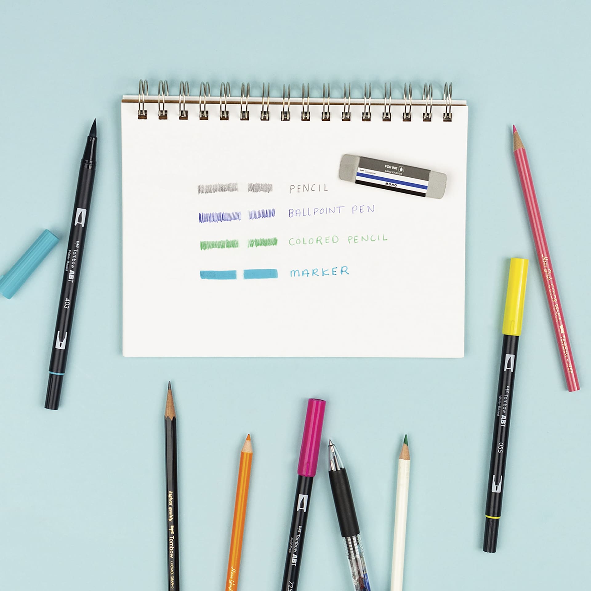 Tombow Mono Colored Pencil Eraser, in use next to pencil, colored pencil, marker, and pen
