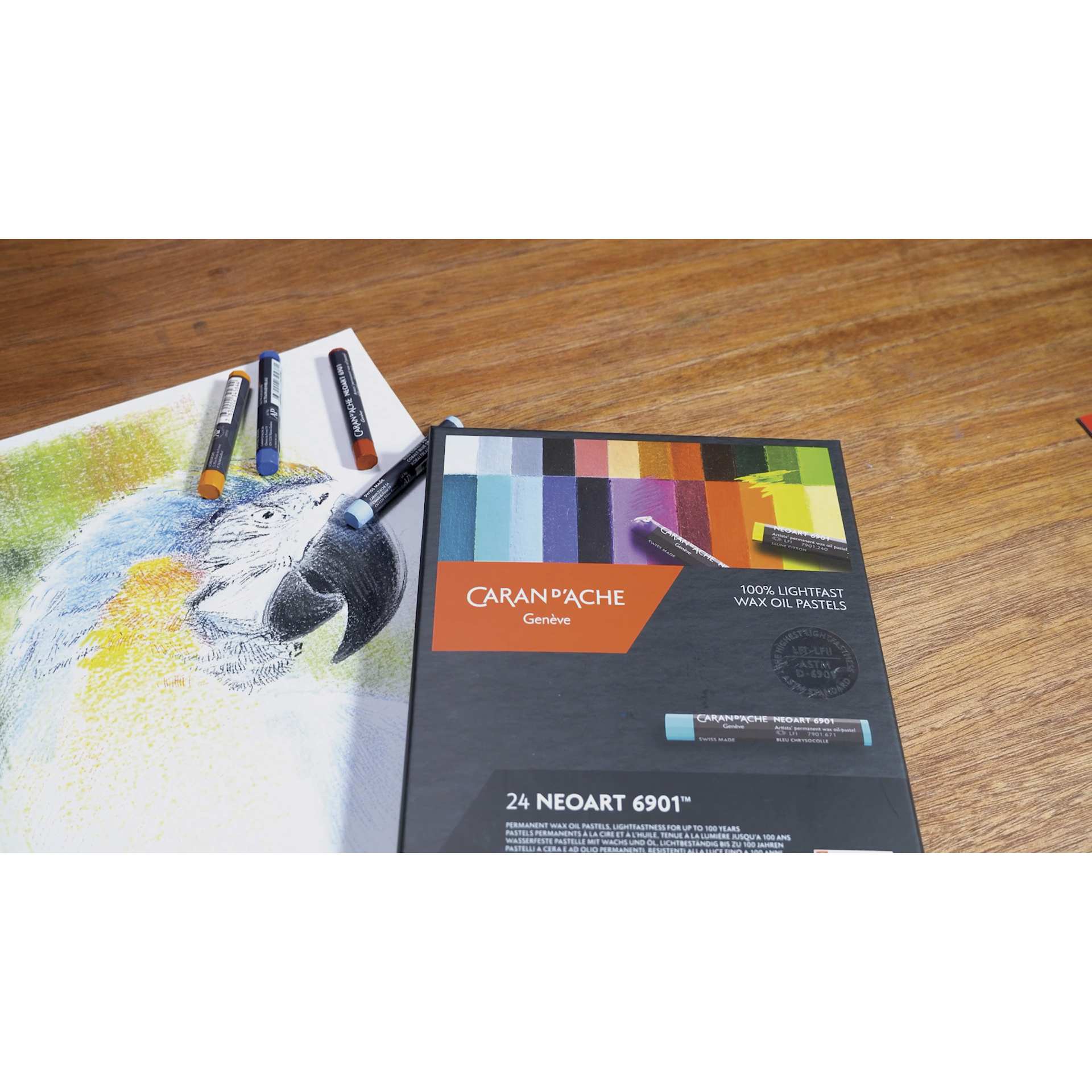 Caran d’Ache Neoart 6901 Pastels - Set of 24, Assorted Colors, on desk