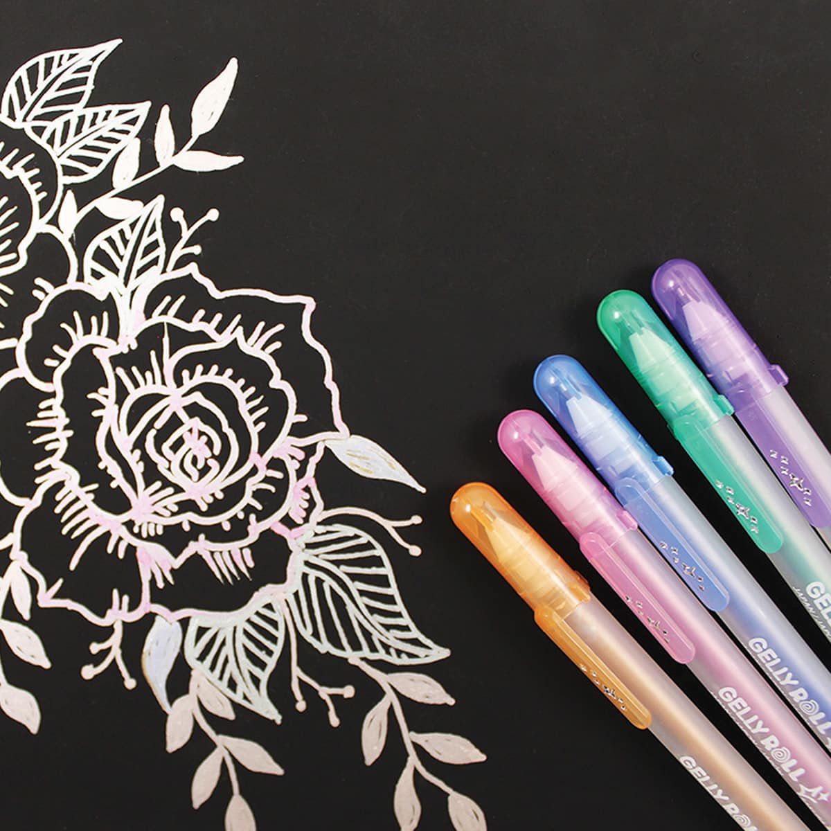 Sakura Gelly Roll Gold-Silver Shadow Pens (example of ink used on black paper)