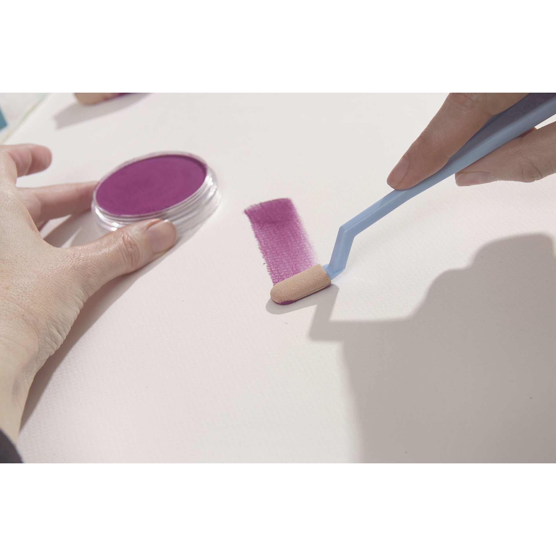 PanPastel Artists' Painting Pastel Set - tool in hand applying pastel