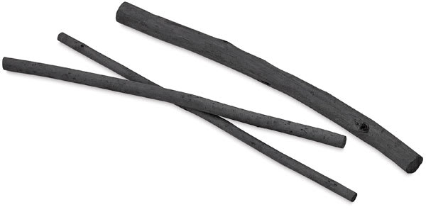 Caran d'Ache Natural Charcoal Set - Three sticks from set shown angled
