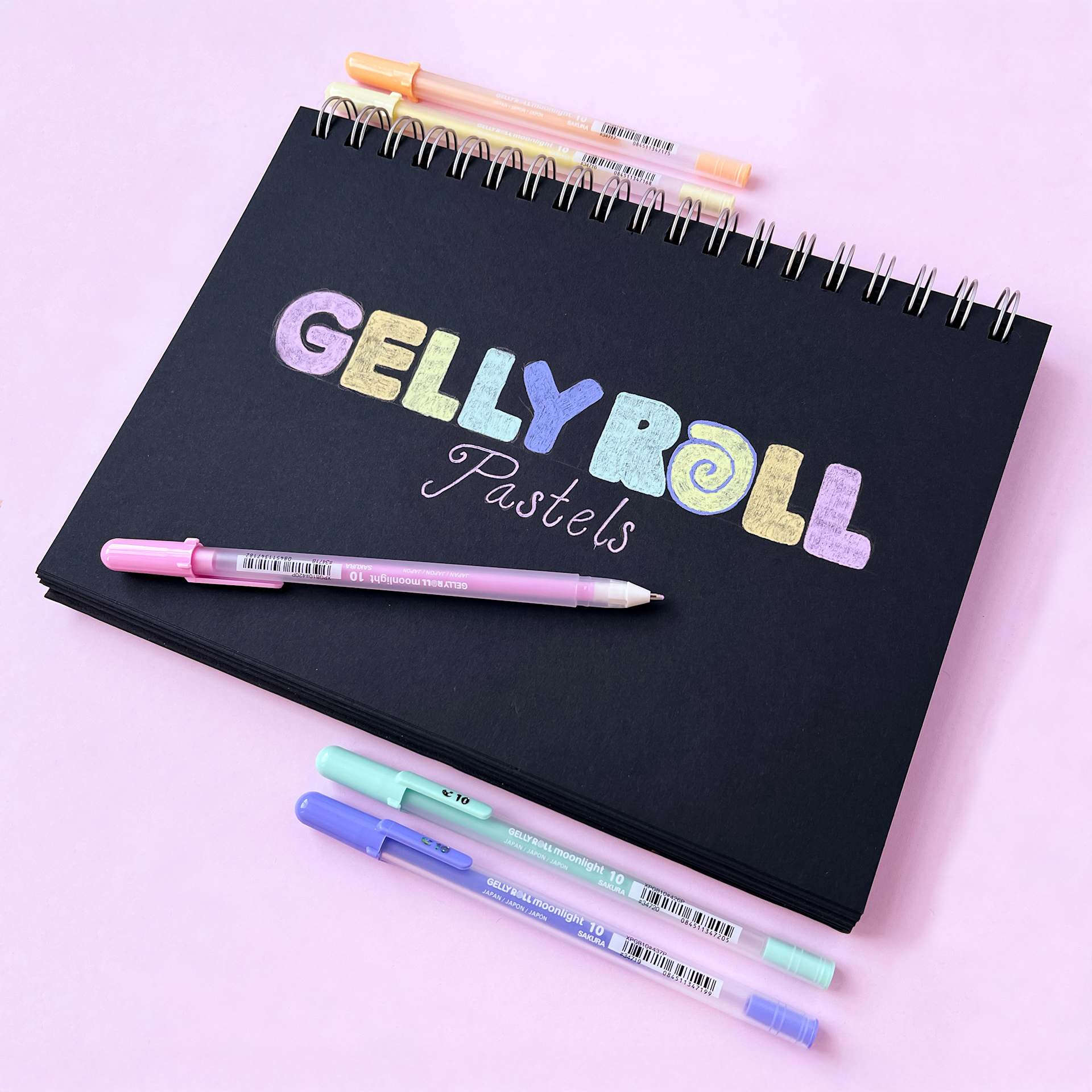 Sakura Gelly Roll Moonlight Pens - Pastel, Set of 5, Bold, on drawing pad (not included)