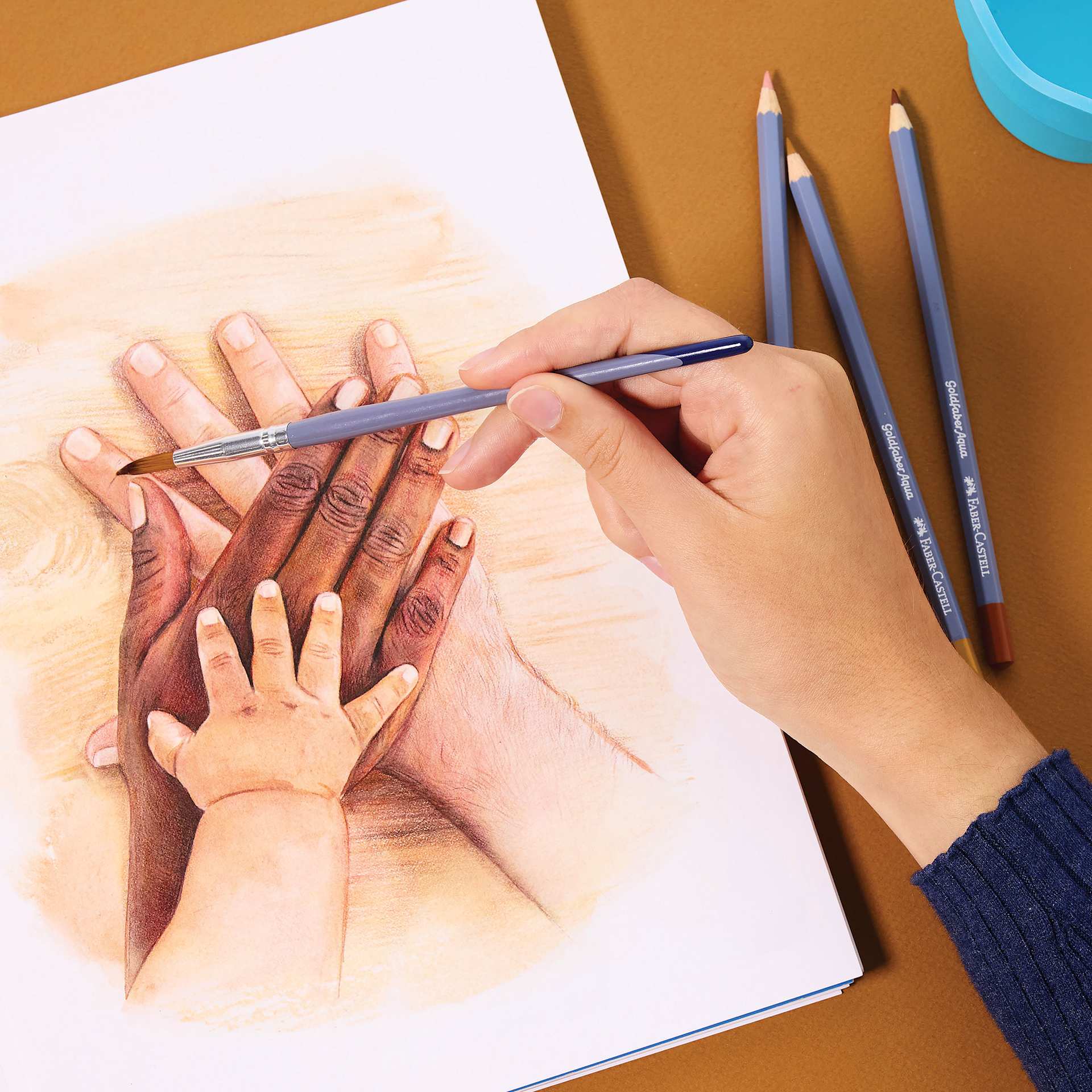 Faber Castell Goldfaber Aqua Watercolor Pencils - Set of 12, Skin Tones, brushing a sketch with water