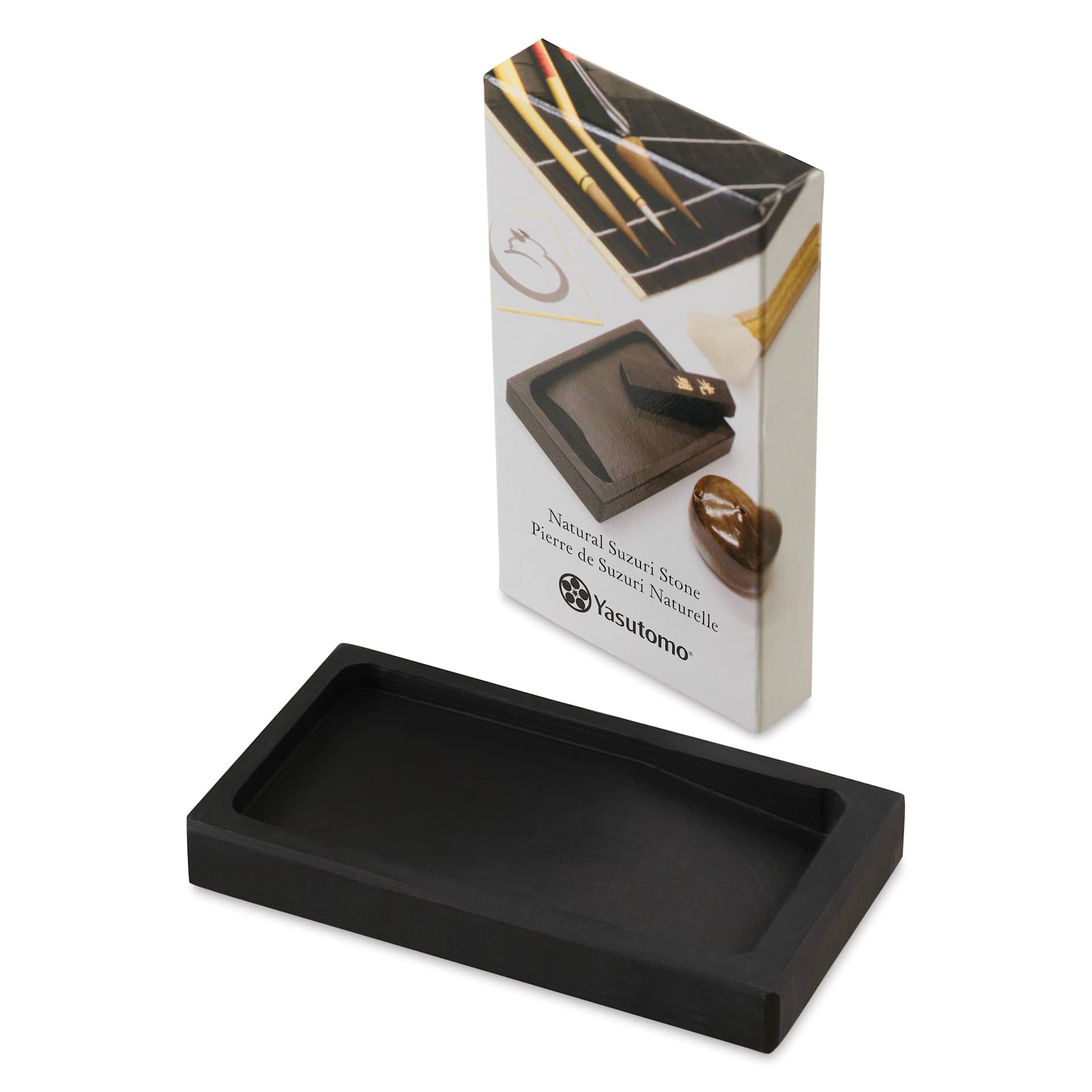 Yasutomo Suzuri Grinding Stone - 5" x 2-1/2", laid flat in front of packaging