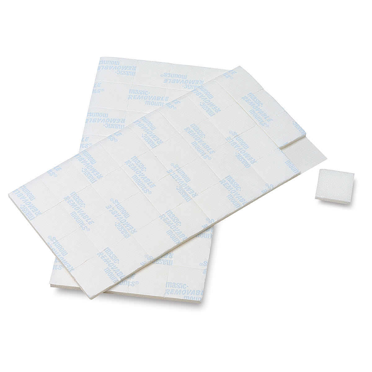 Removable Mounting Tabs - 2 sheets of 1/2 " tabs shown with 1 tab removed