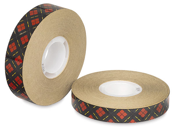 3M Scotch Adhesive Transfer Tape - 2 rolls of tape shown, one upright 
