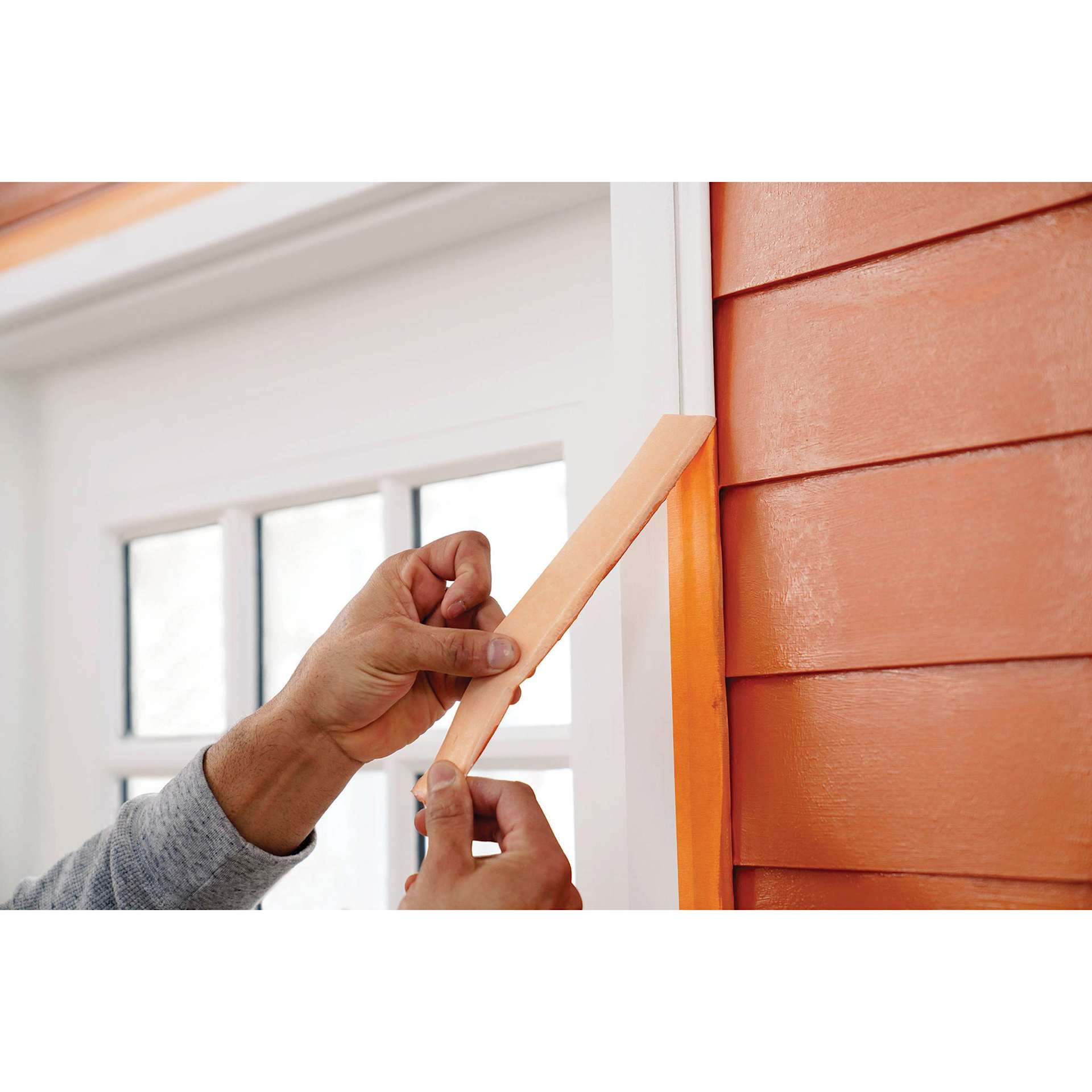 Scotch Heavy Duty Masking Tape, being removed from trim