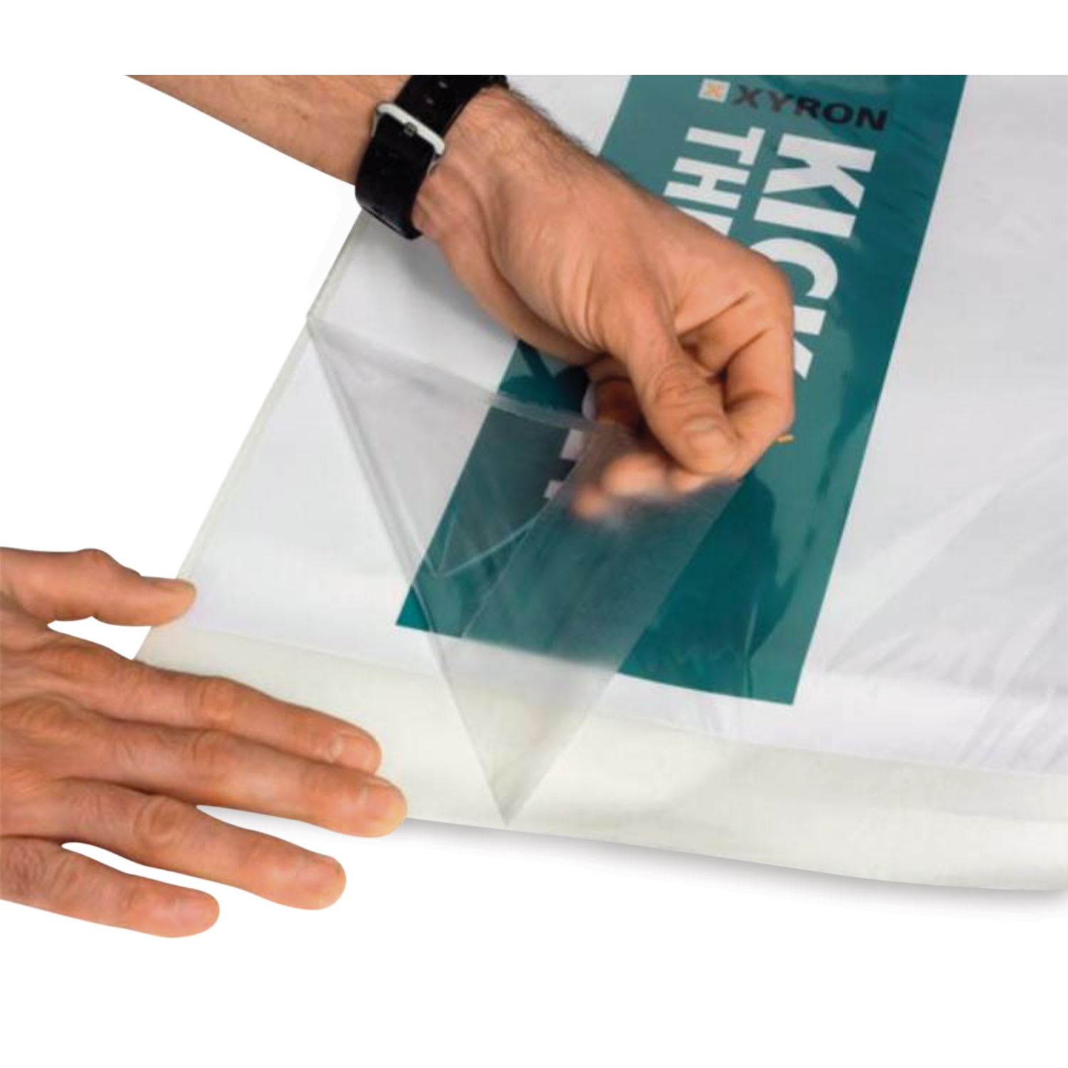 Xyron Pro XM1255 Cold Laminator - 12" laminate being peeled