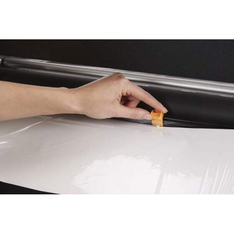 Xyron Pro XM2500 Cold Laminator cutting away laminate