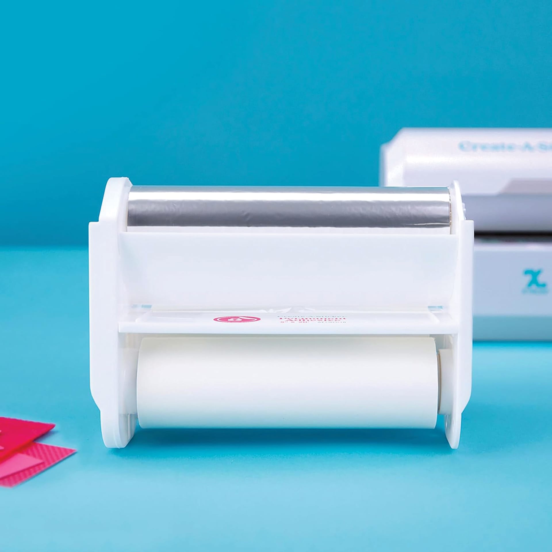 Xyron Create-A-Sticker Permanent Refill Cartridge sitting on table