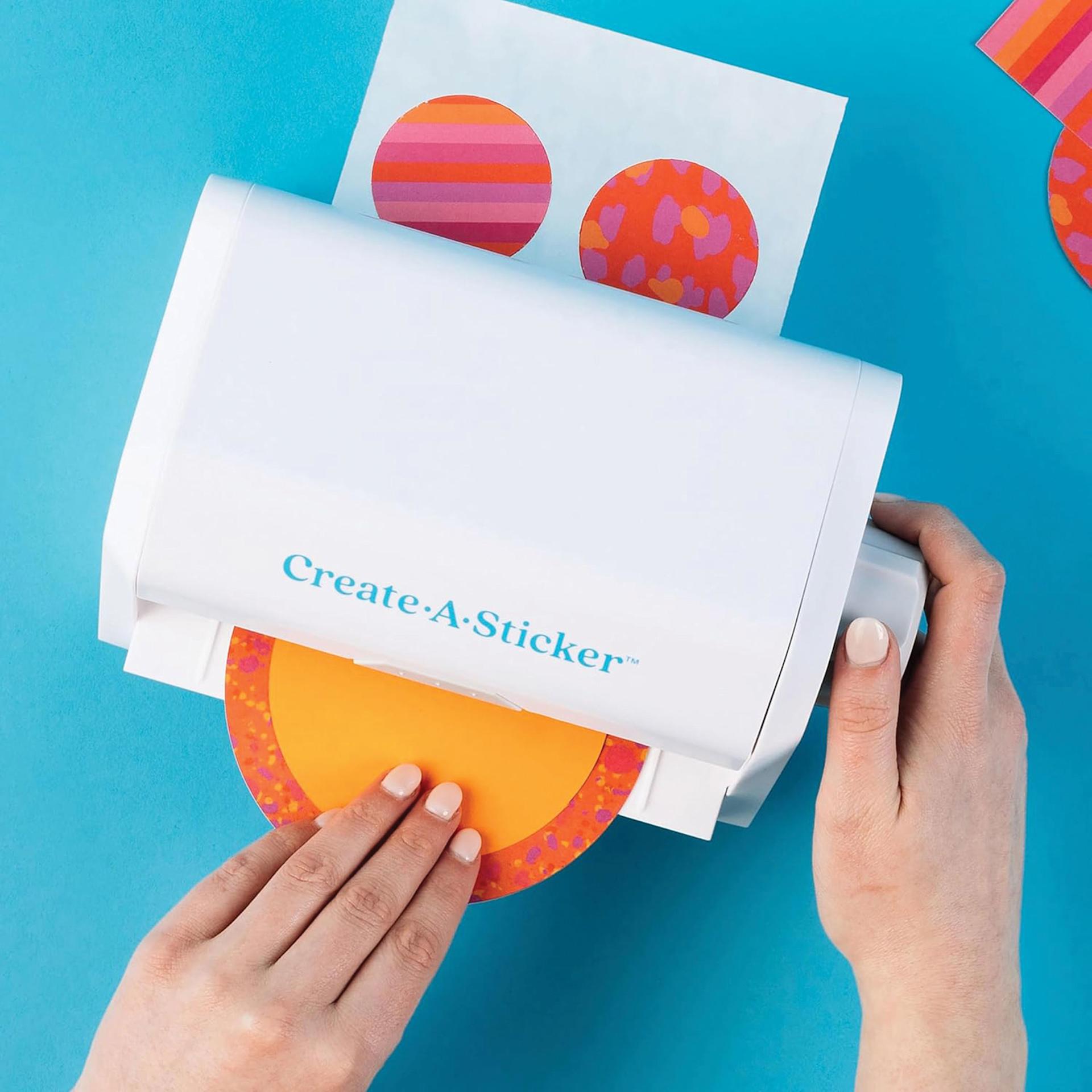 Xyron Create-A-Sticker Permanent Refill Cartridge inside Xyron Create-A-Sticker Sticker Maker (sold separately) creating stickers