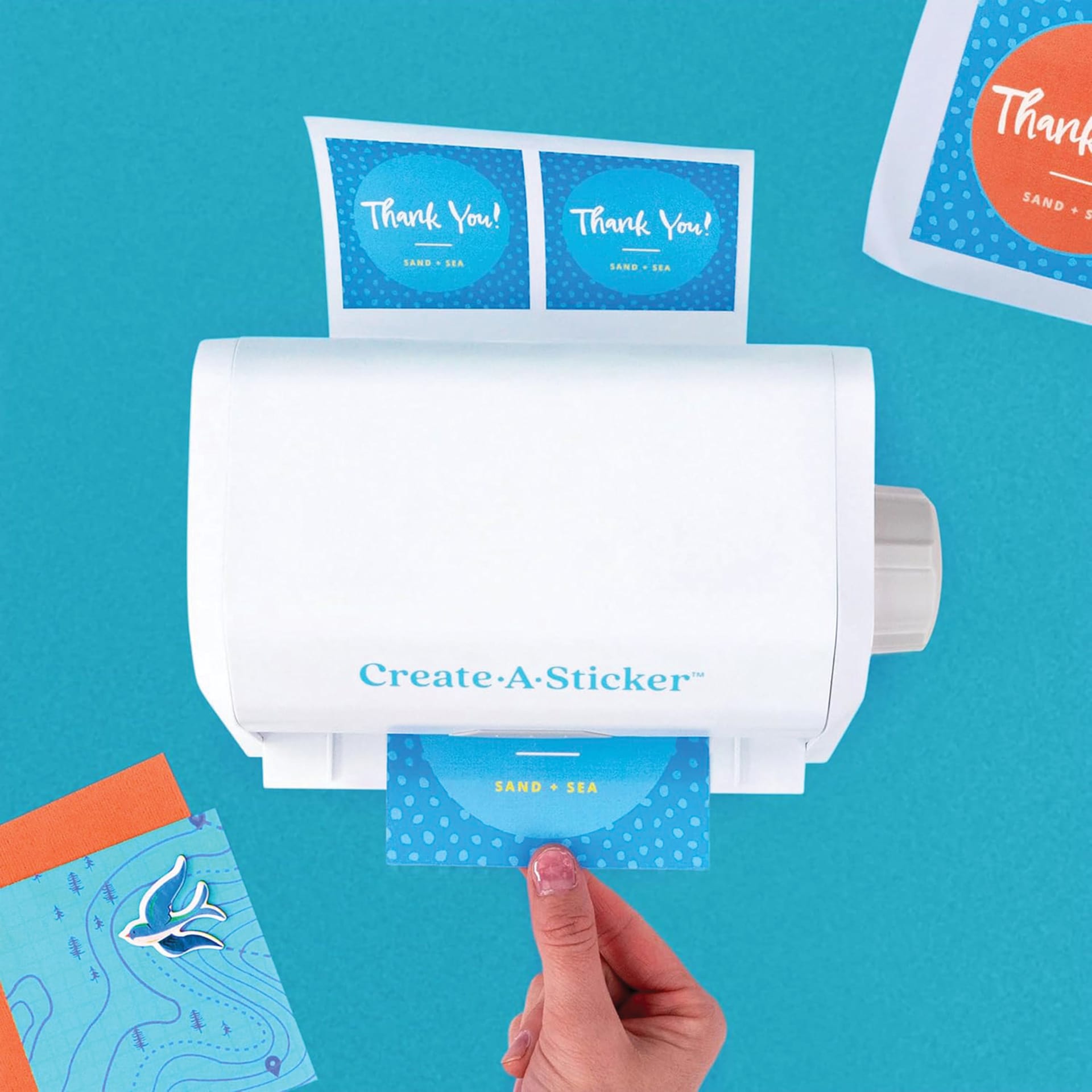 Xyron Create-A-Sticker Permanent Refill Cartridge inside Xyron Create-A-Sticker Sticker Maker (sold separately) being used