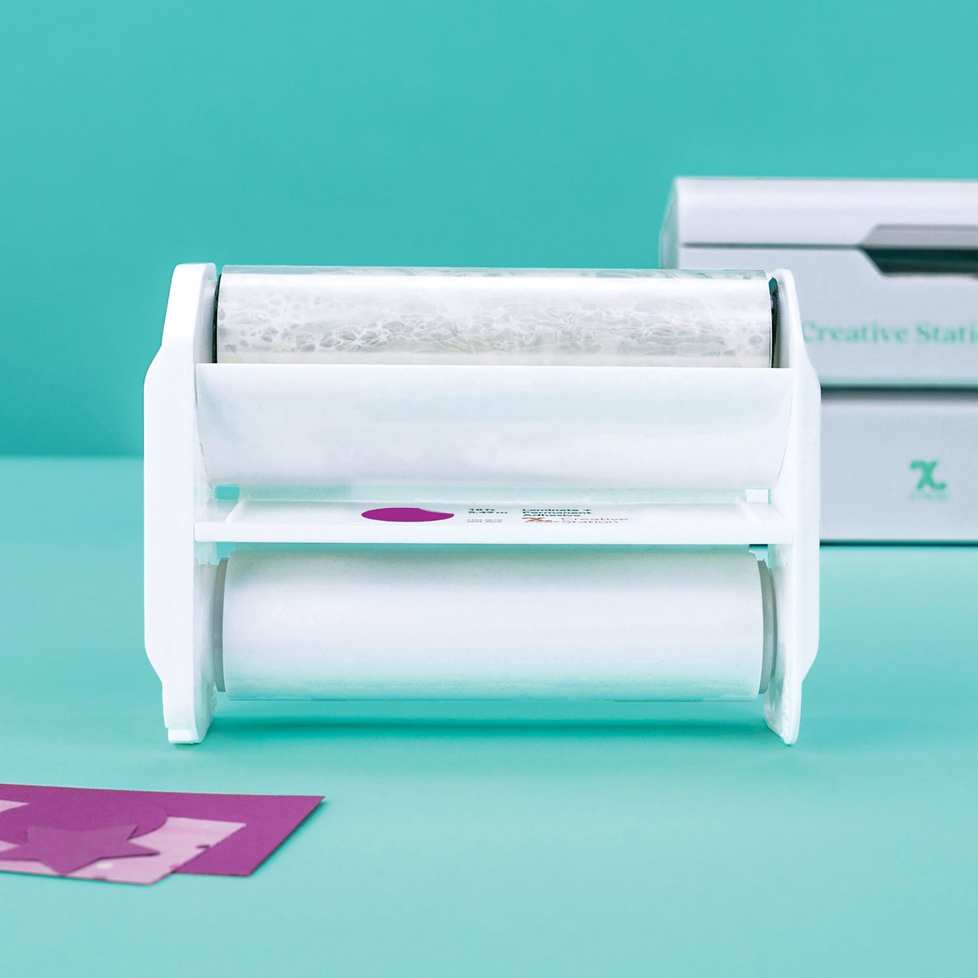 Xyron Creative Station Lite Laminated Adhesive Refill Cartridge outside of laminator