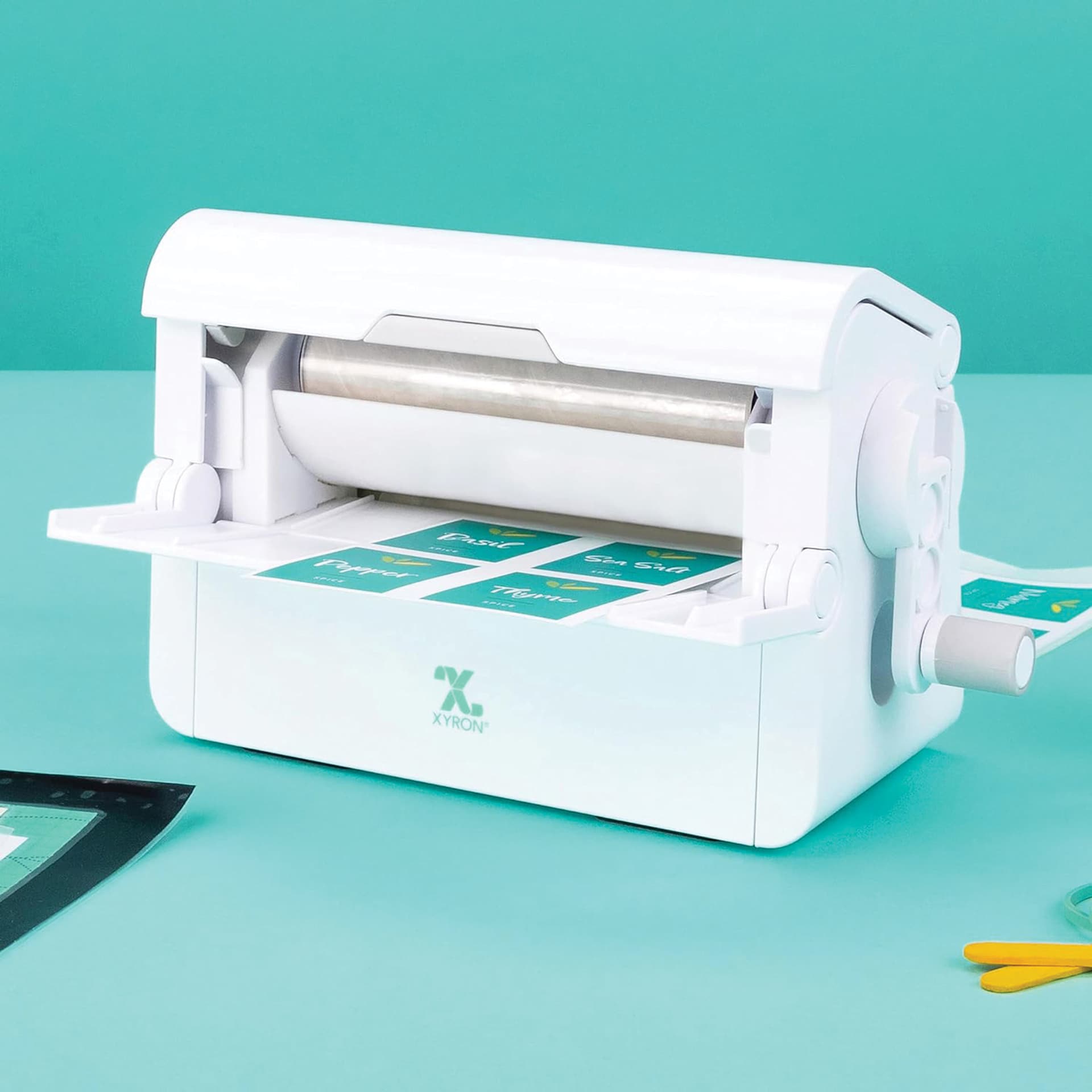 Xyron Creative Station Lite Laminated Adhesive Refill Cartridge inside laminator back view