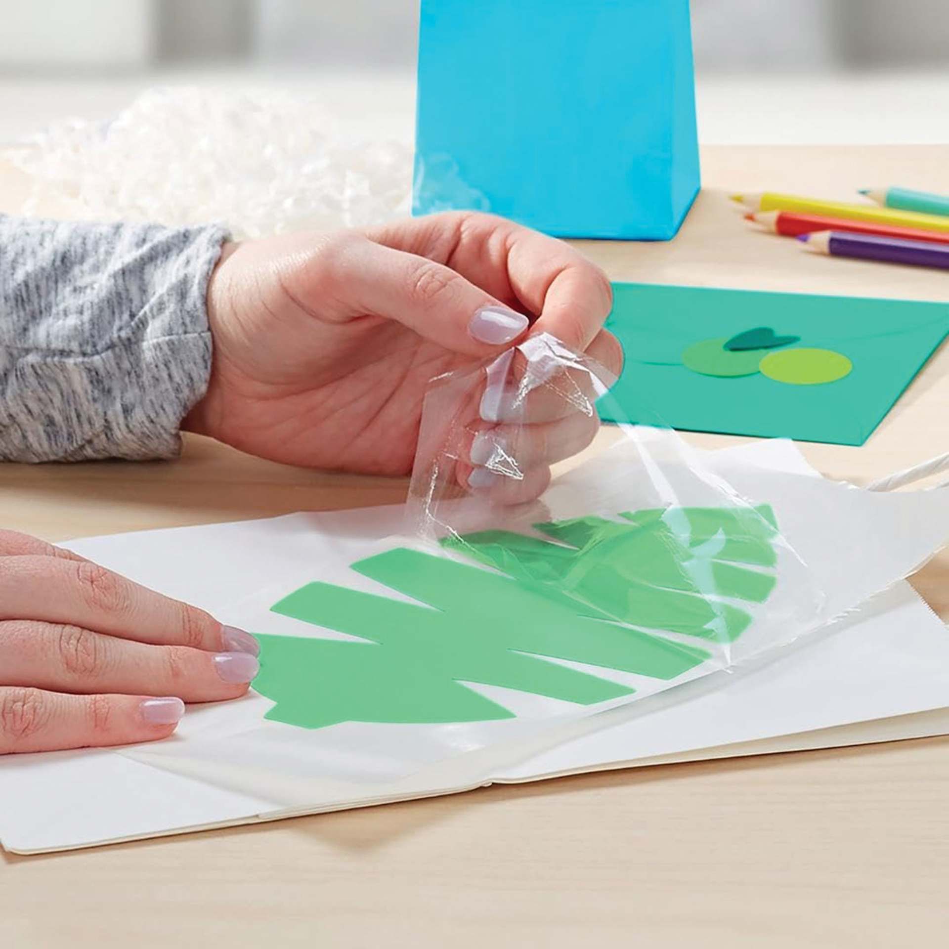 Xyron Creative Station Lite Multi-Use Applicator peeling laminate