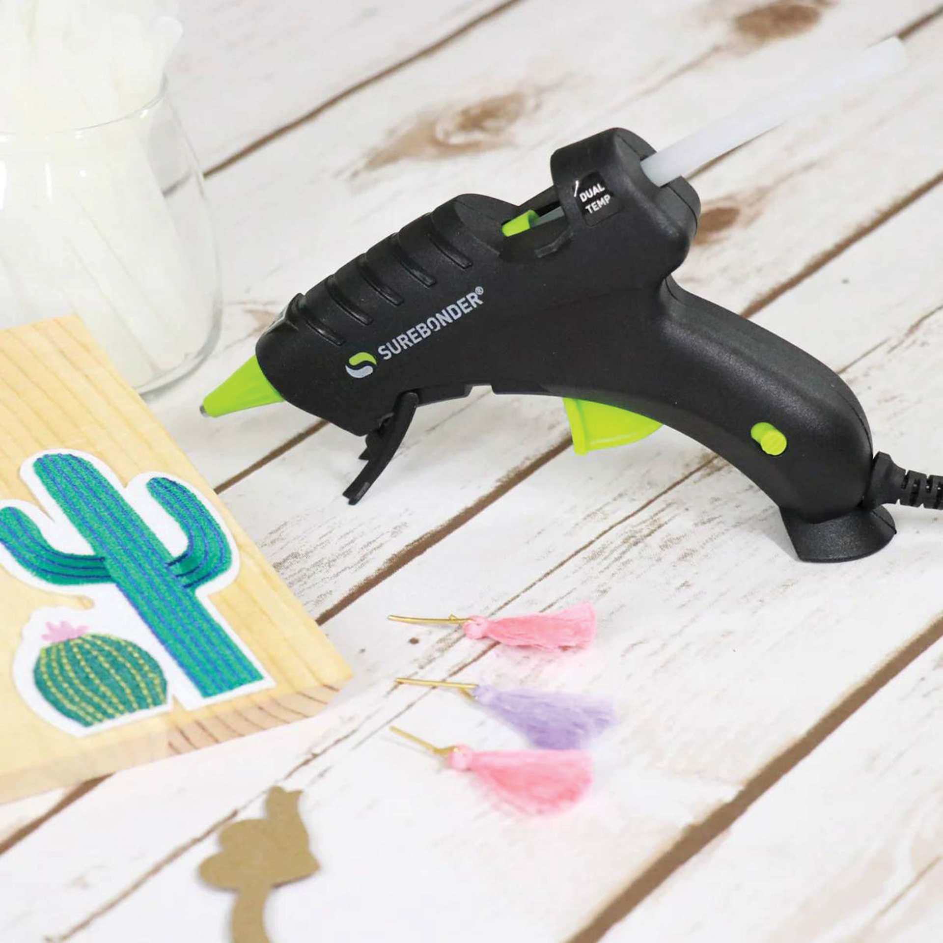 Surebonder Plus Series Mini Dual Temp Glue Gun Kit, glue gun on table