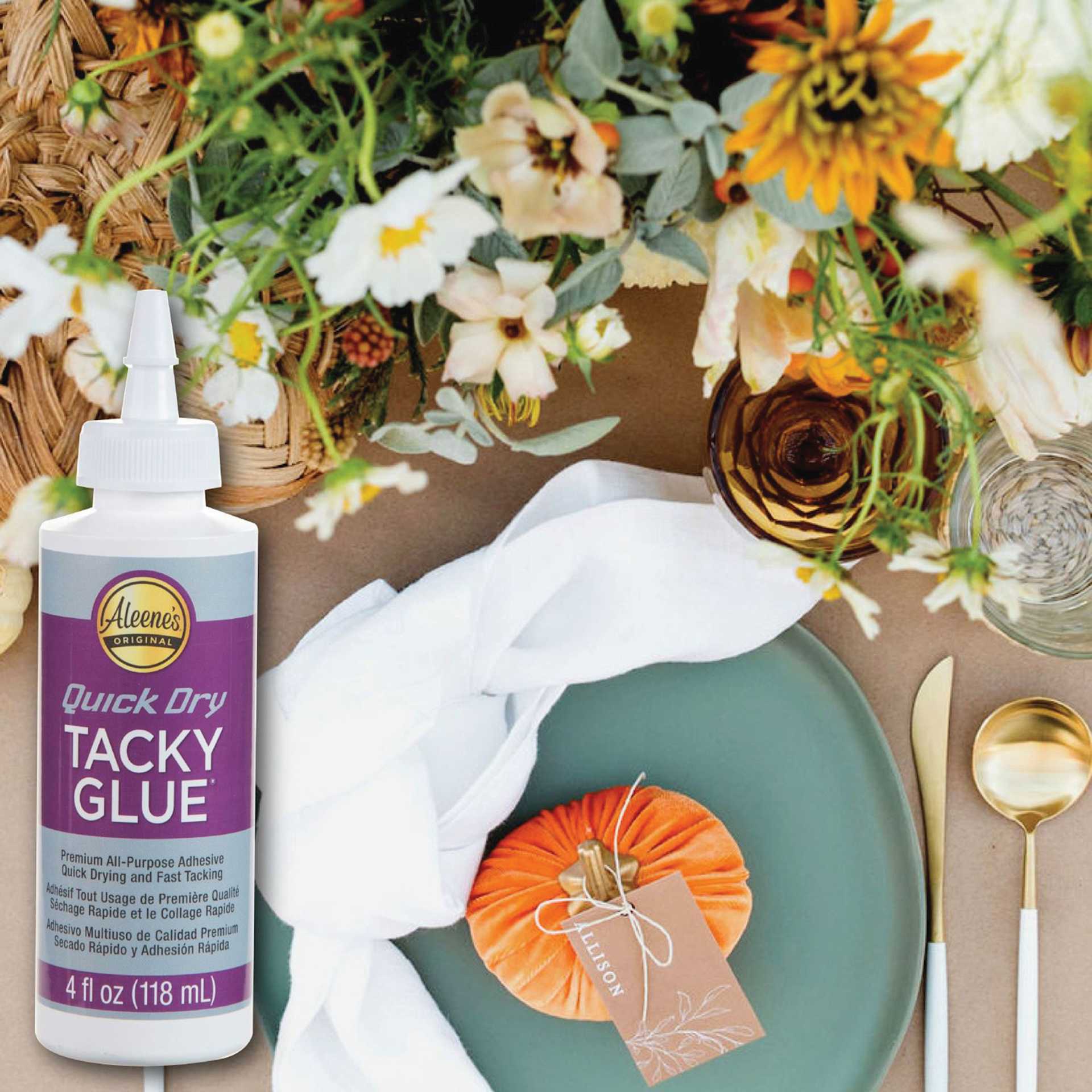 Aleene's Quick Dry Tacky Glue - 4 oz Bottle shown with completed floral project