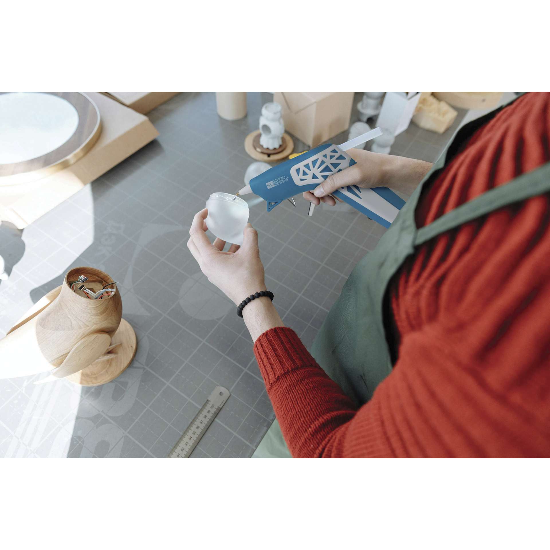 Studio Designs Cordless Glue Gun - Blue and White w/ Web Grip - in use