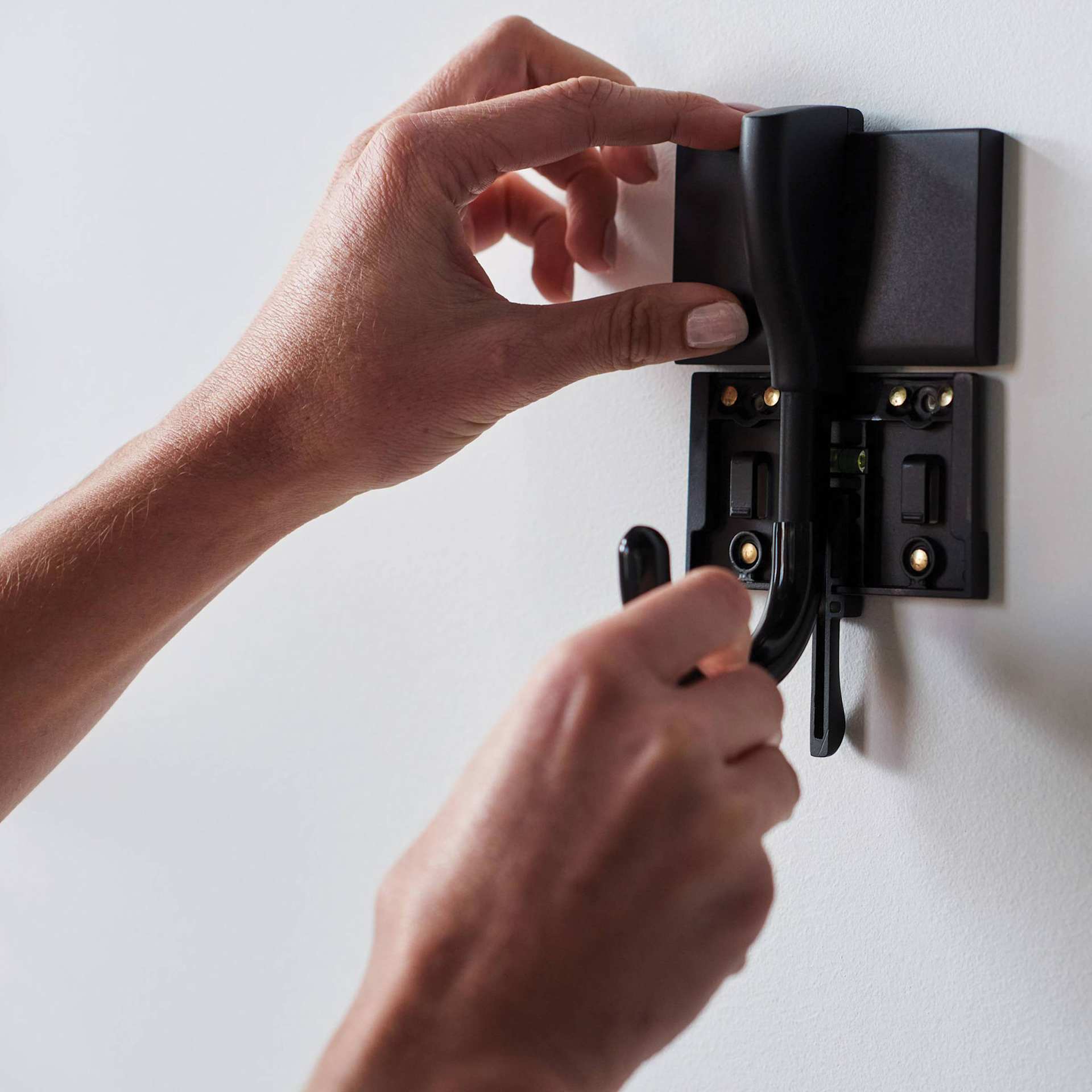 Duck EasyMounts Heavy-Duty Drywall Hook, covering the secured mount with hook.