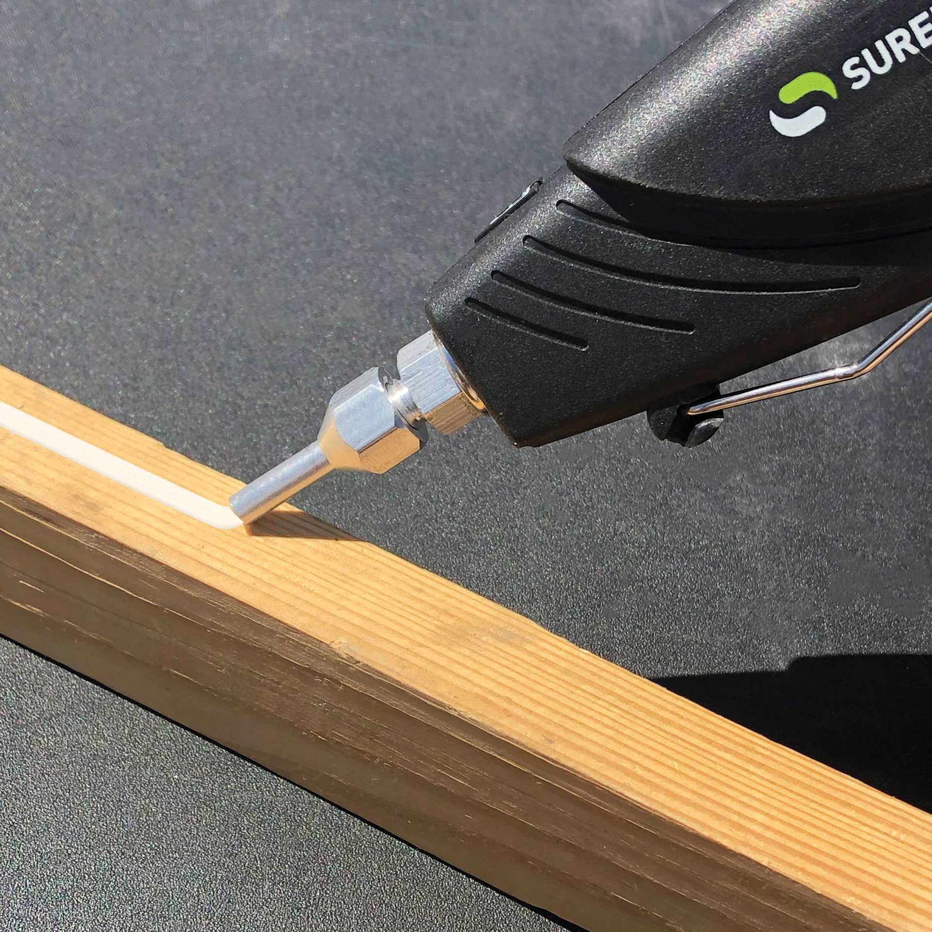 Surebonder Interchangeable Hot Glue Gun Nozzles (Close-up of glue bead)