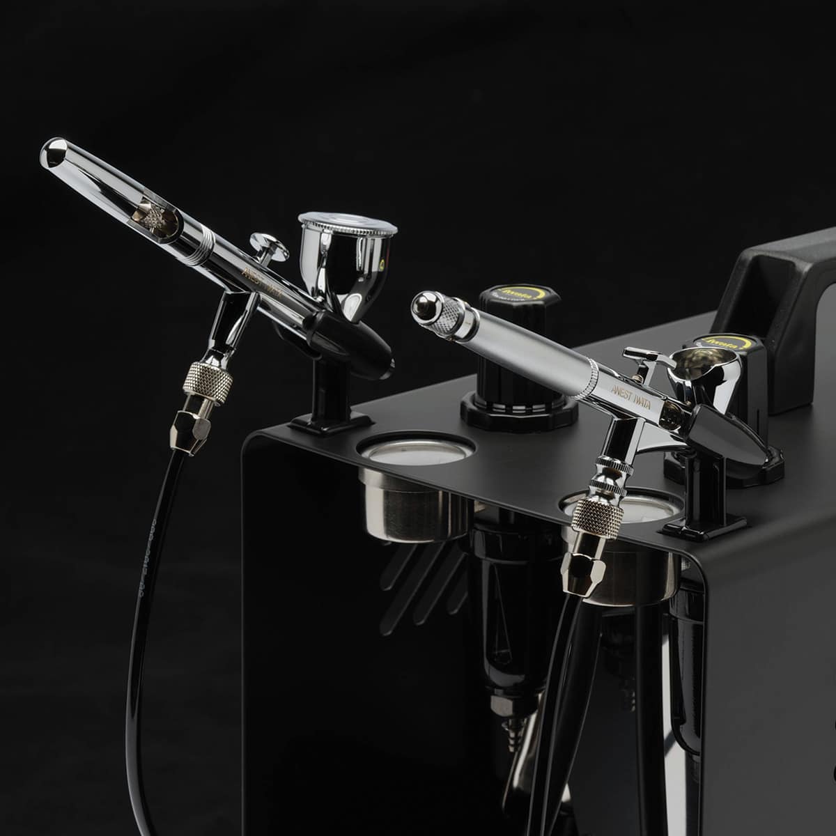 Iwata Power Jet Pro Studio Compressor- Shown with airbrushes in holders (not included)
