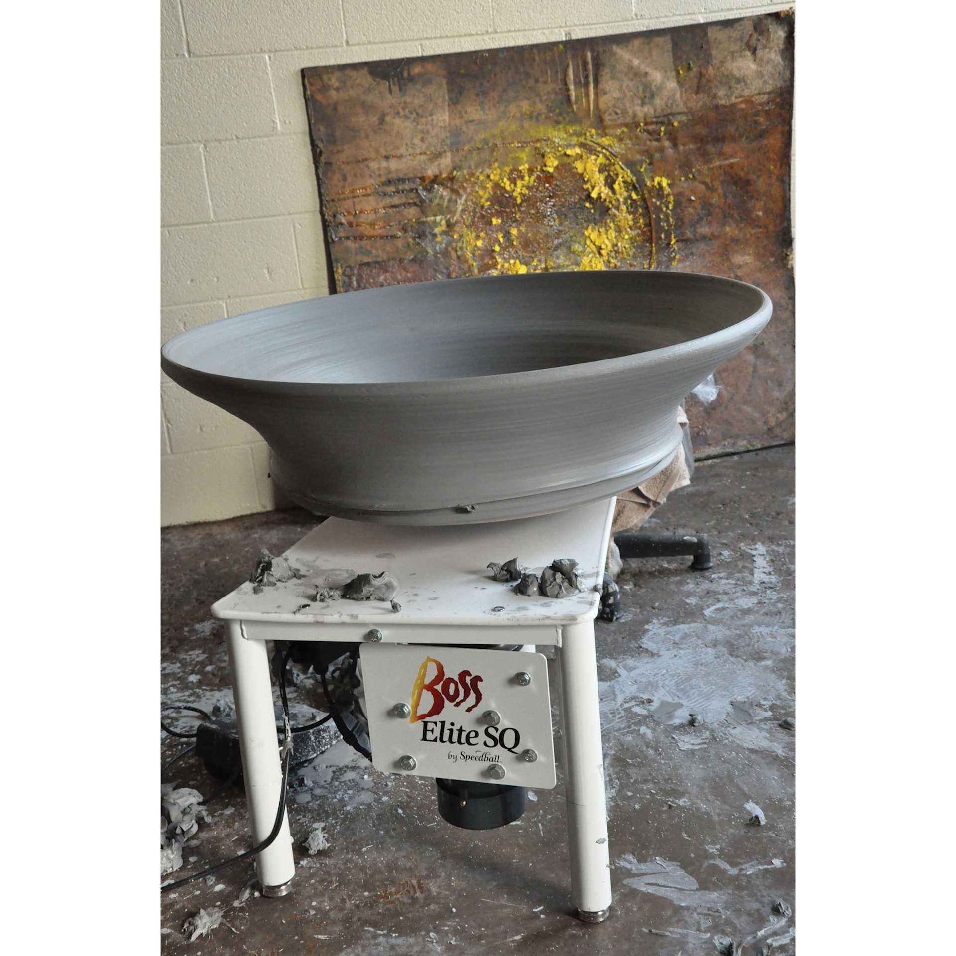 Speedball Boss Elite Potter’s Wheel with clay bowl resting on it