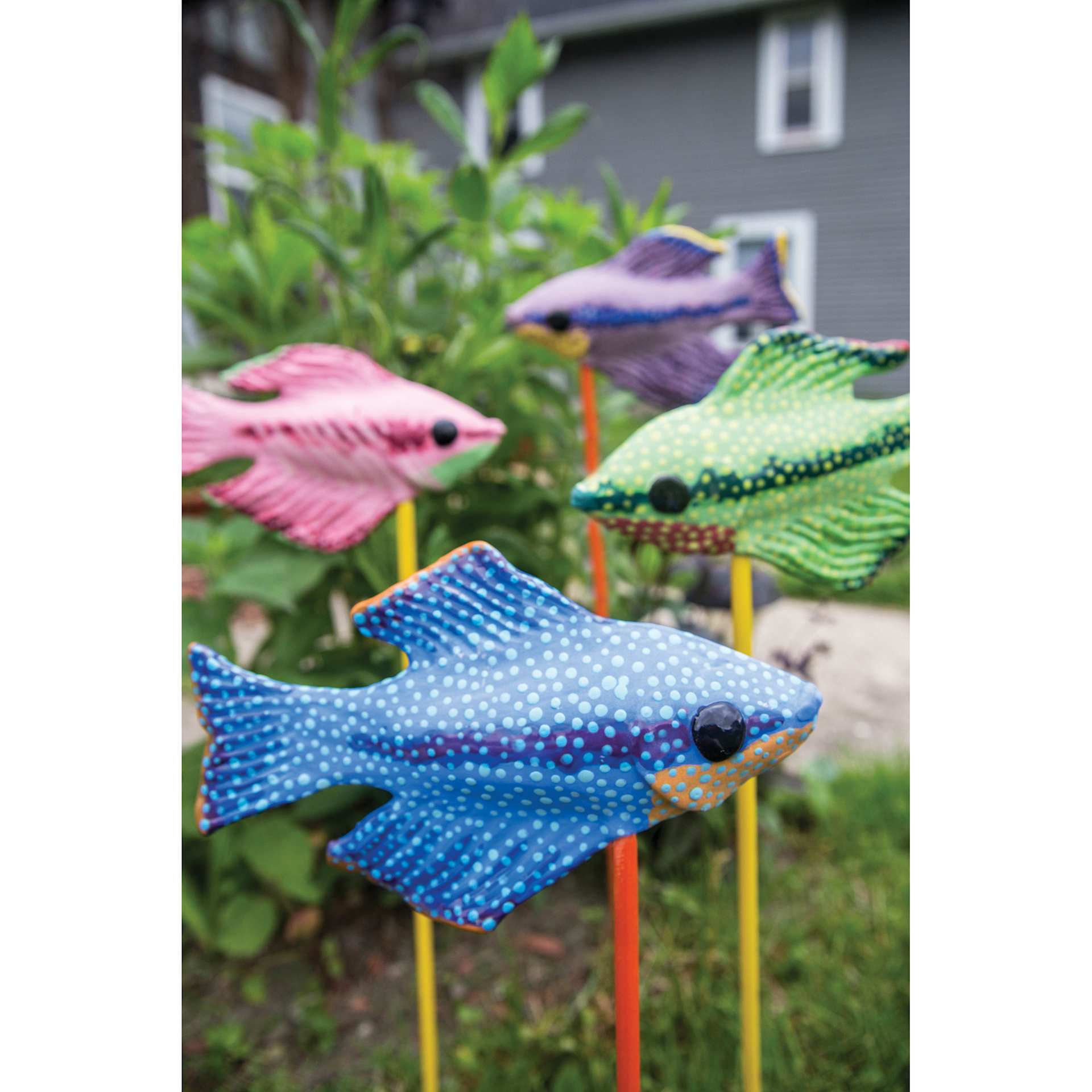 Fish yard sculptures glazed with Amaco LUG Liquid Underglaze
