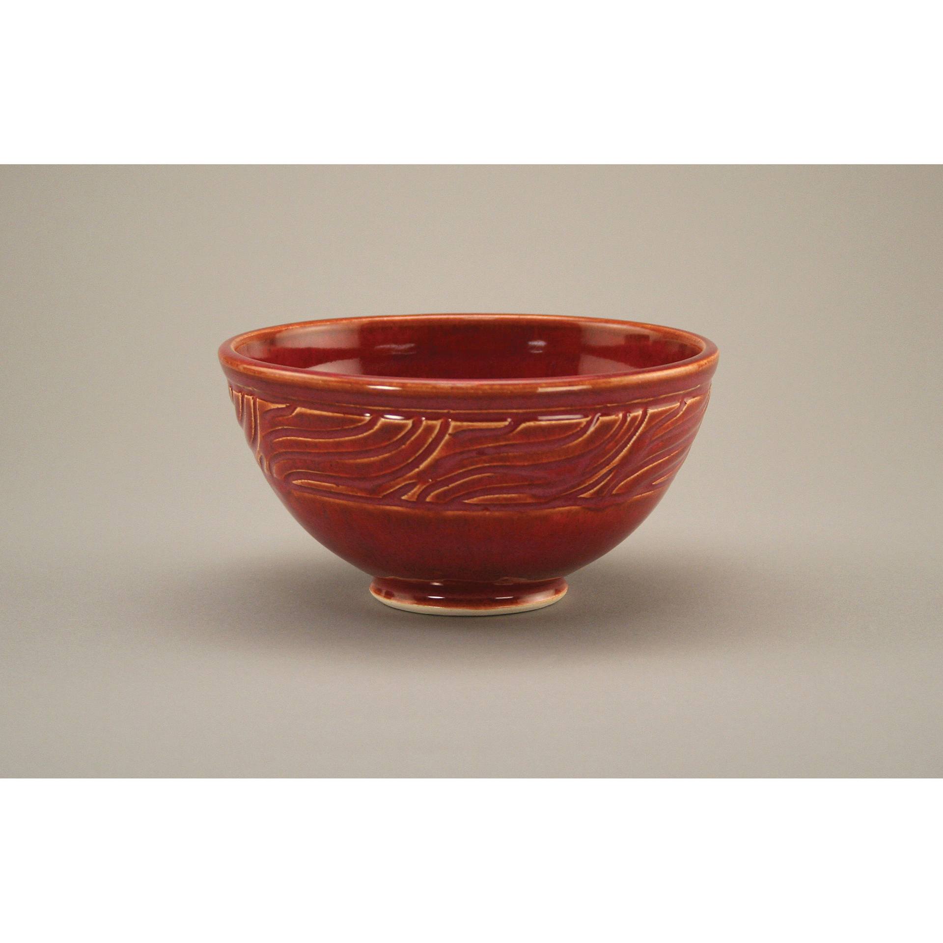 Chun Plum Amaco Potter's Choice Glaze applied to a bowl.