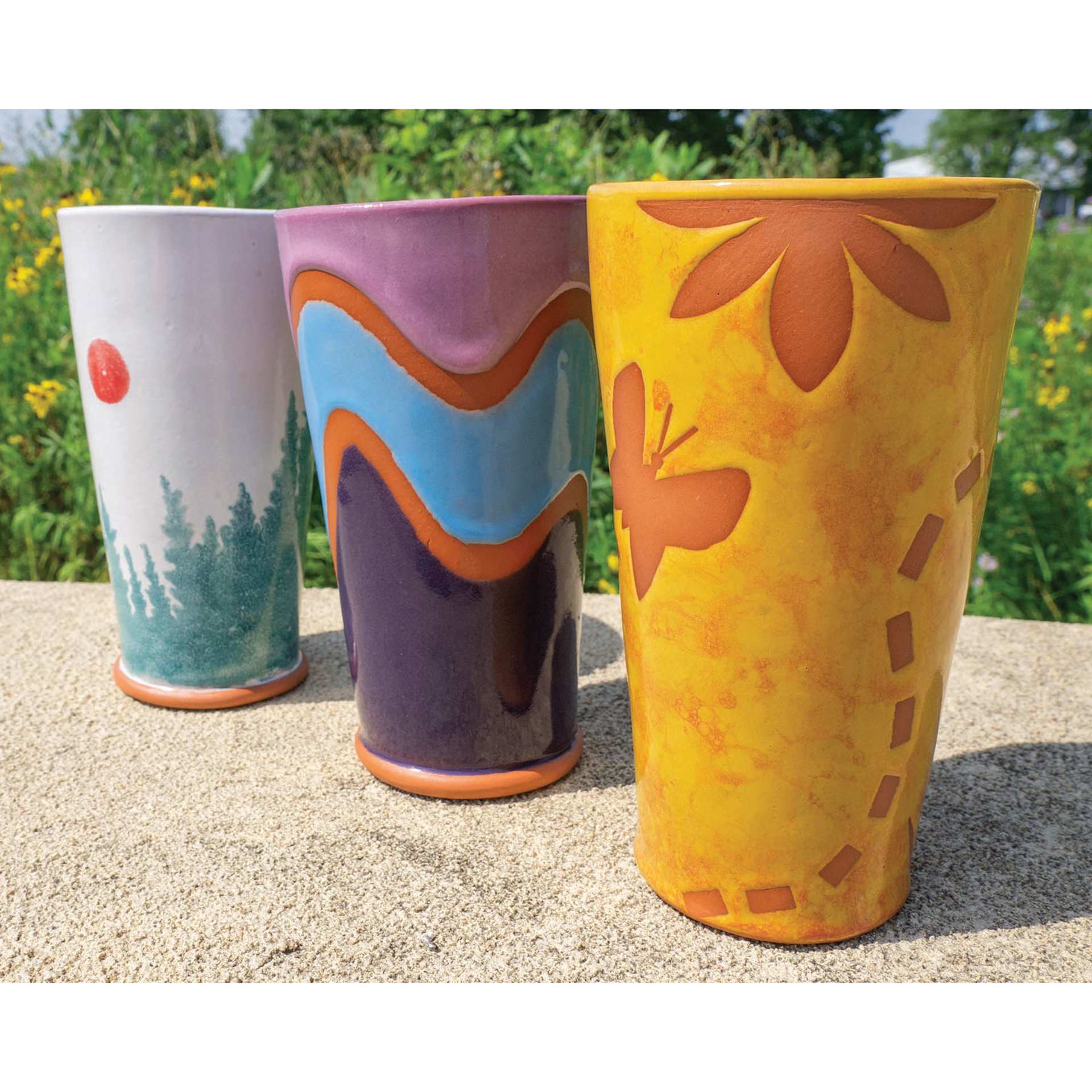 Amaco Teacher's Palette Glazes applied to various upright ceramic pieces