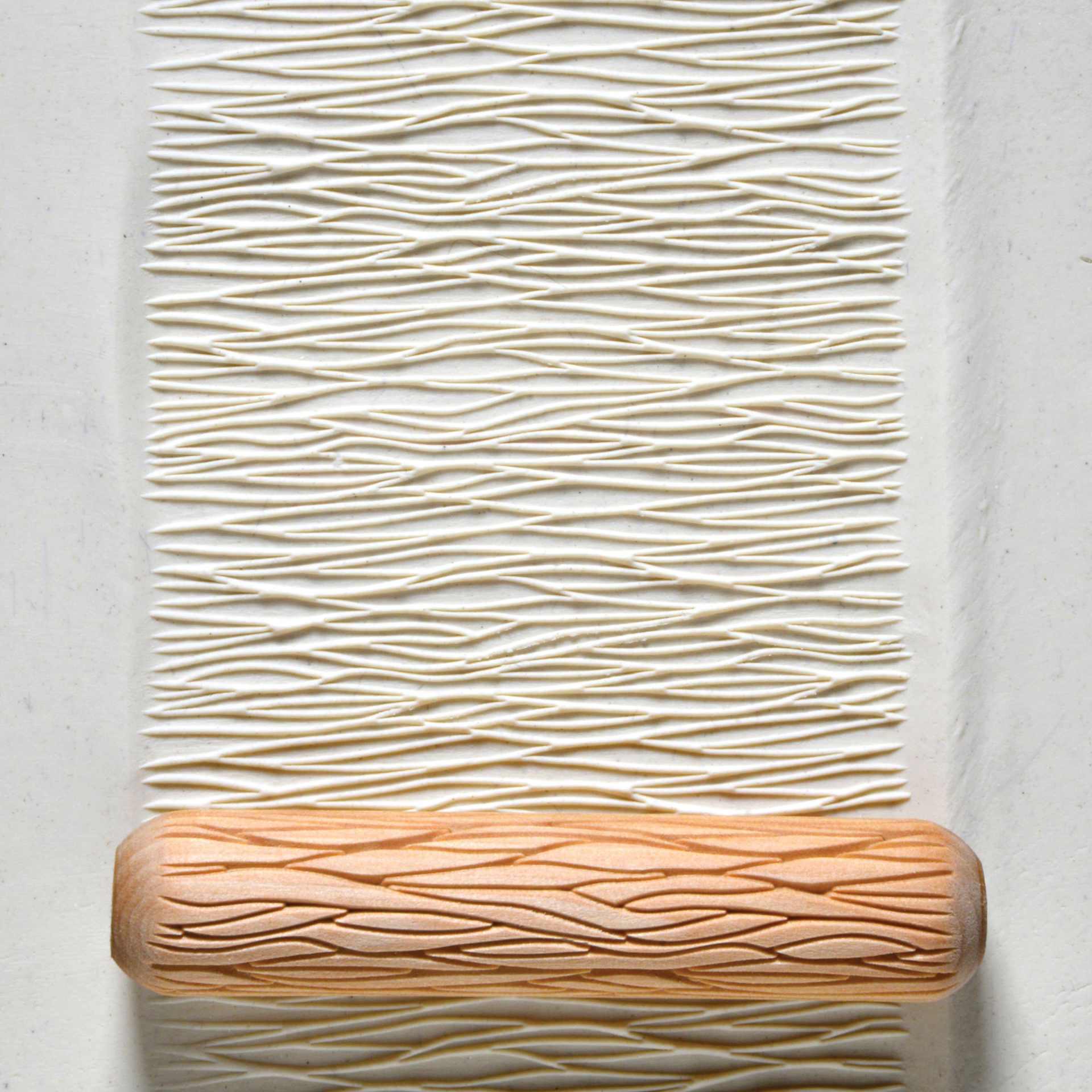 MKM Pottery Tools Big Hand Roller - Sedimentary Layers applied to clay