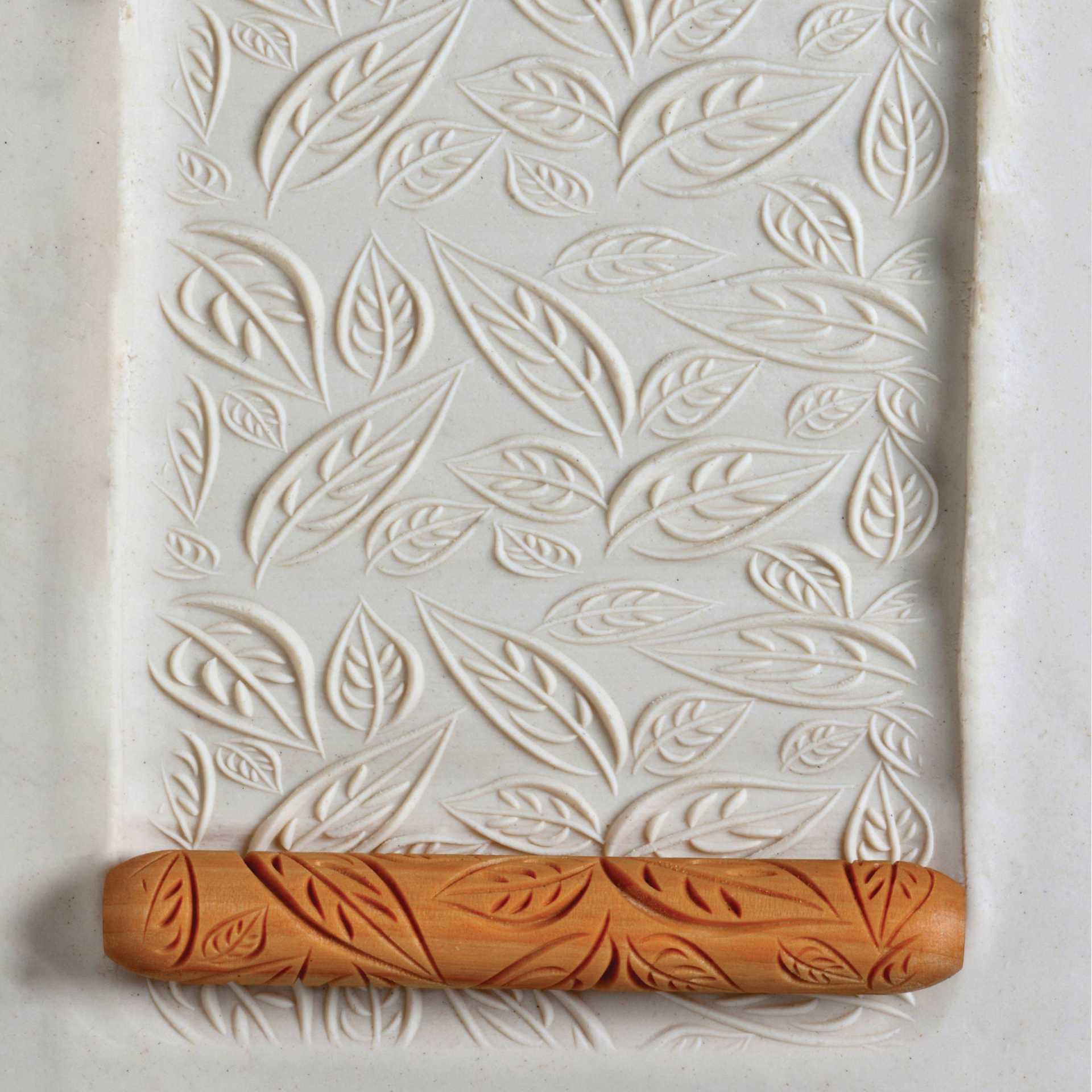 MKM Pottery Tools Hand Roller - Leaves applied to clay