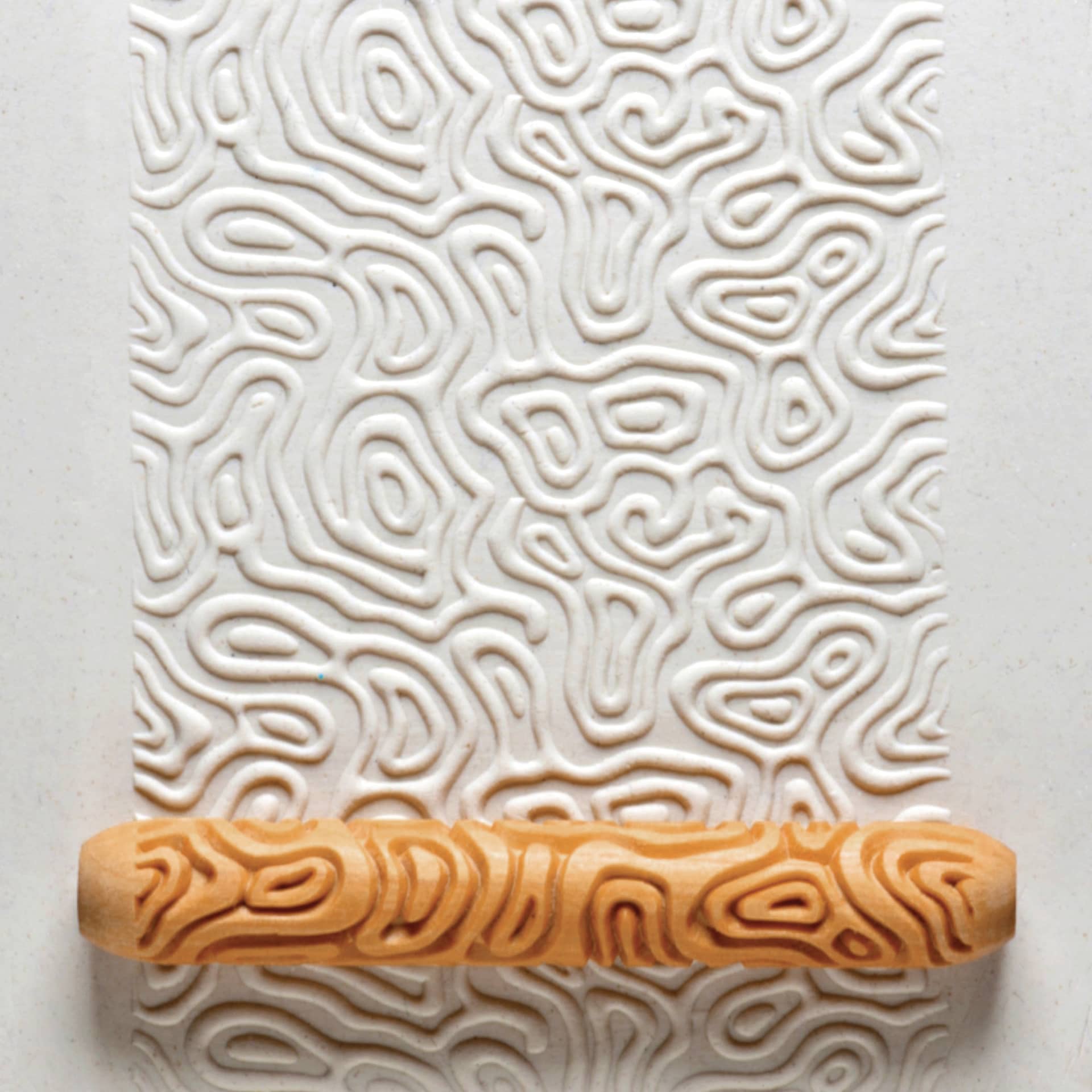 MKM Pottery Tools Hand Roller - Topographic applied to clay