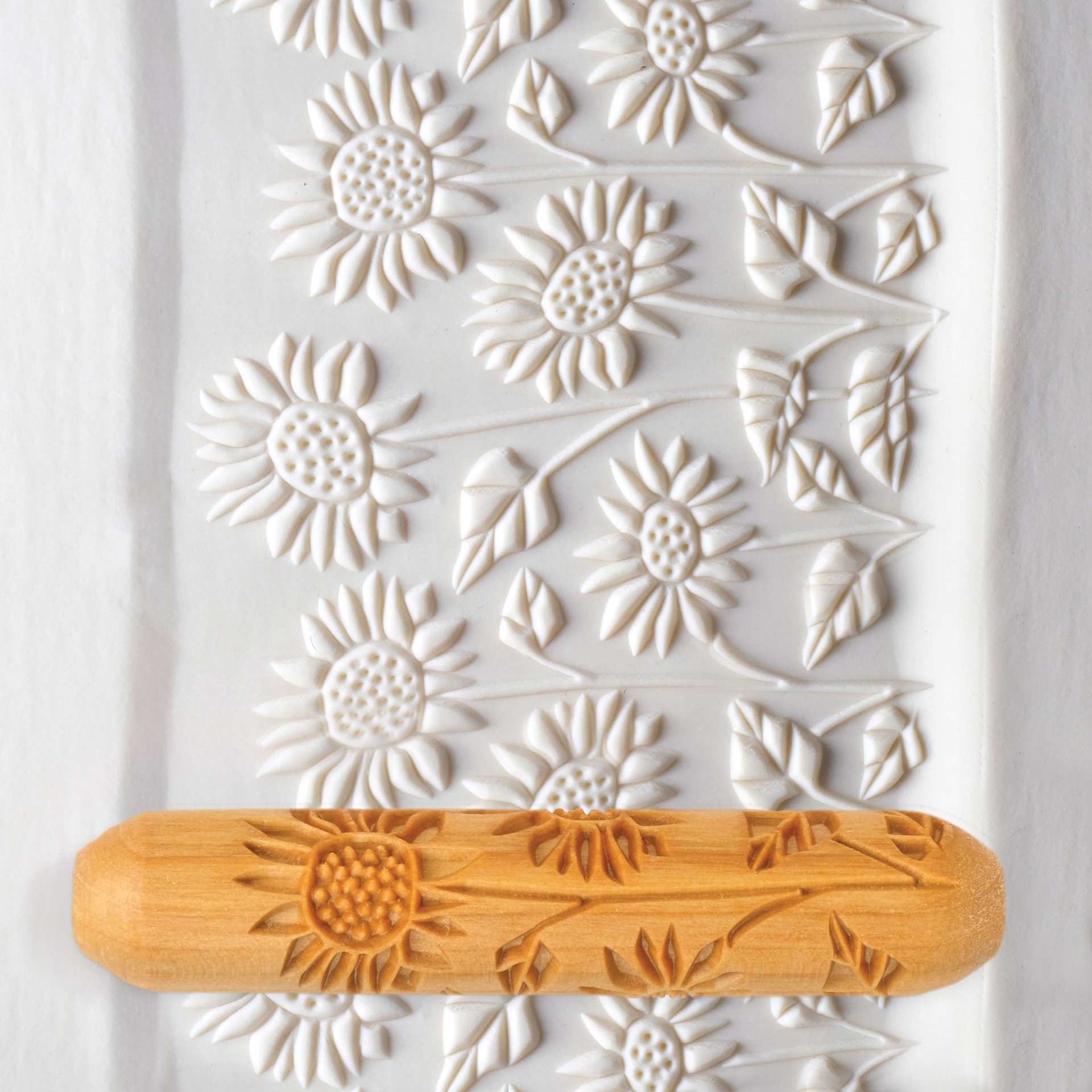 MKM Pottery Tools Big Hand Roller - Field of Sunflowers applied to clay