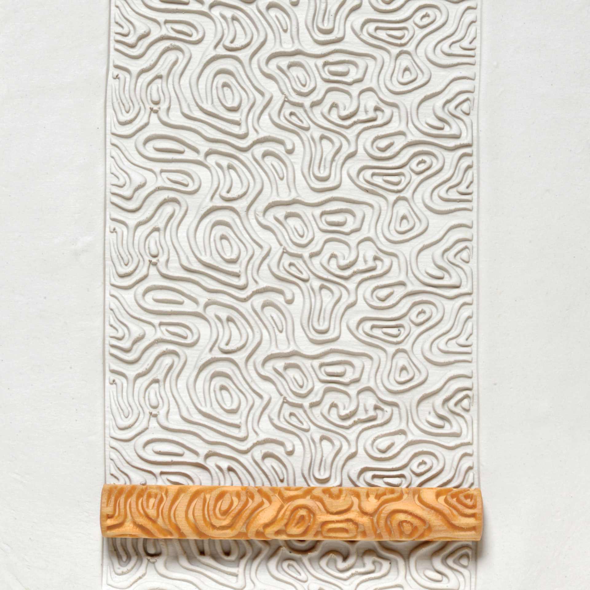 MKM Pottery Tools Twig Hand Roller - Topographic applied to clay