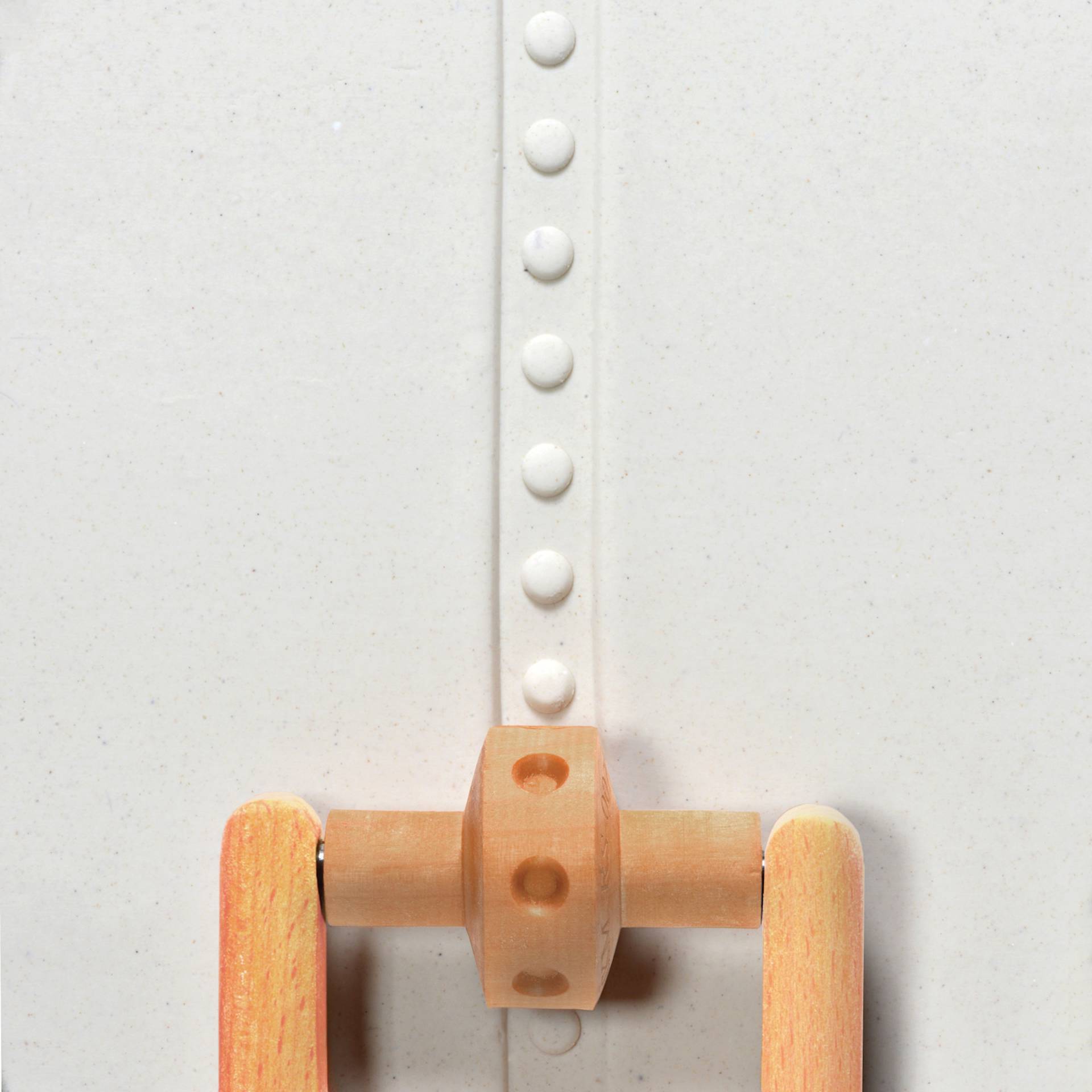 MKM Pottery Tools Small Handle Roller - Debossed Dots applied to clay