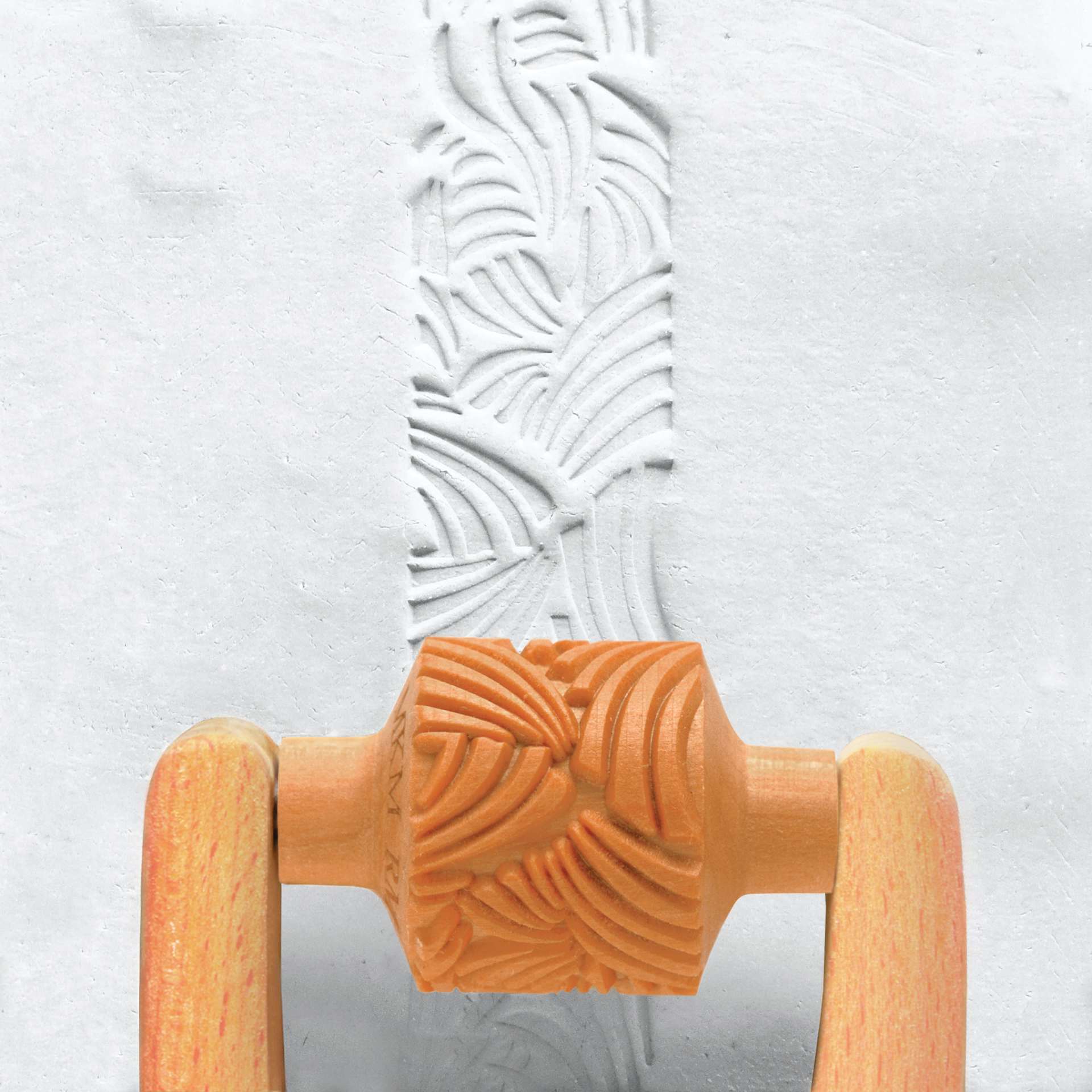 MKM Pottery Tools Medium Handle Roller - Wild Organic Abstract applied to clay