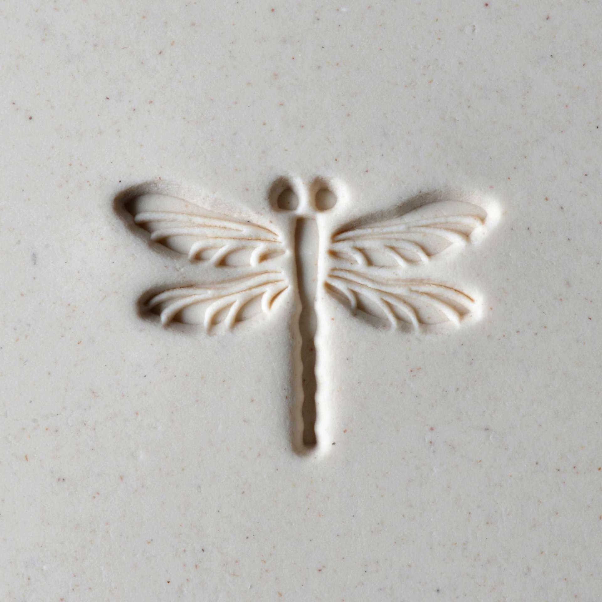 MKM Pottery Tools Large Round Stamp - SCL-098, Dragonfly applied to clay