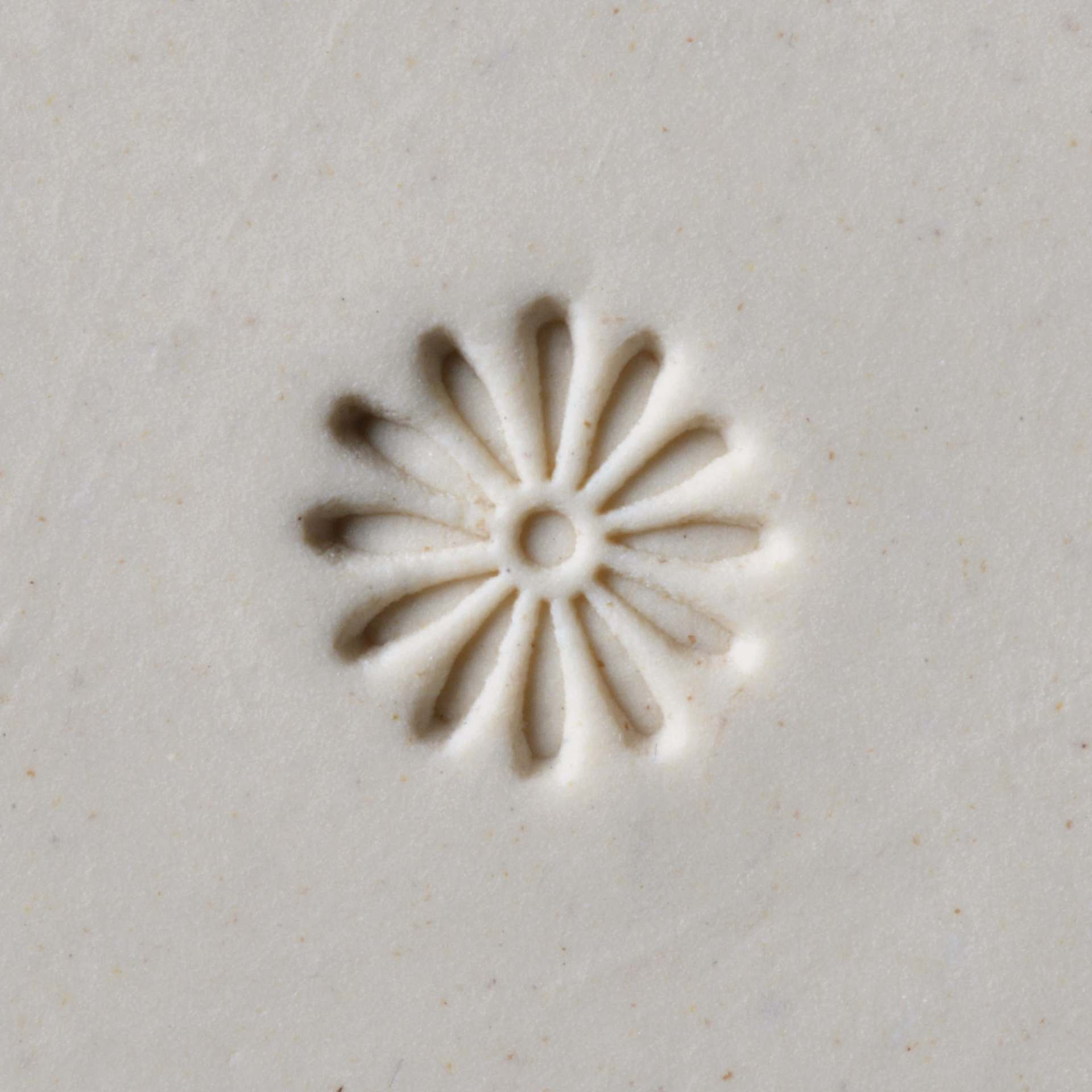 MKM Pottery Tools Small Round Stamp - SCS-004, Daisy applied to clay