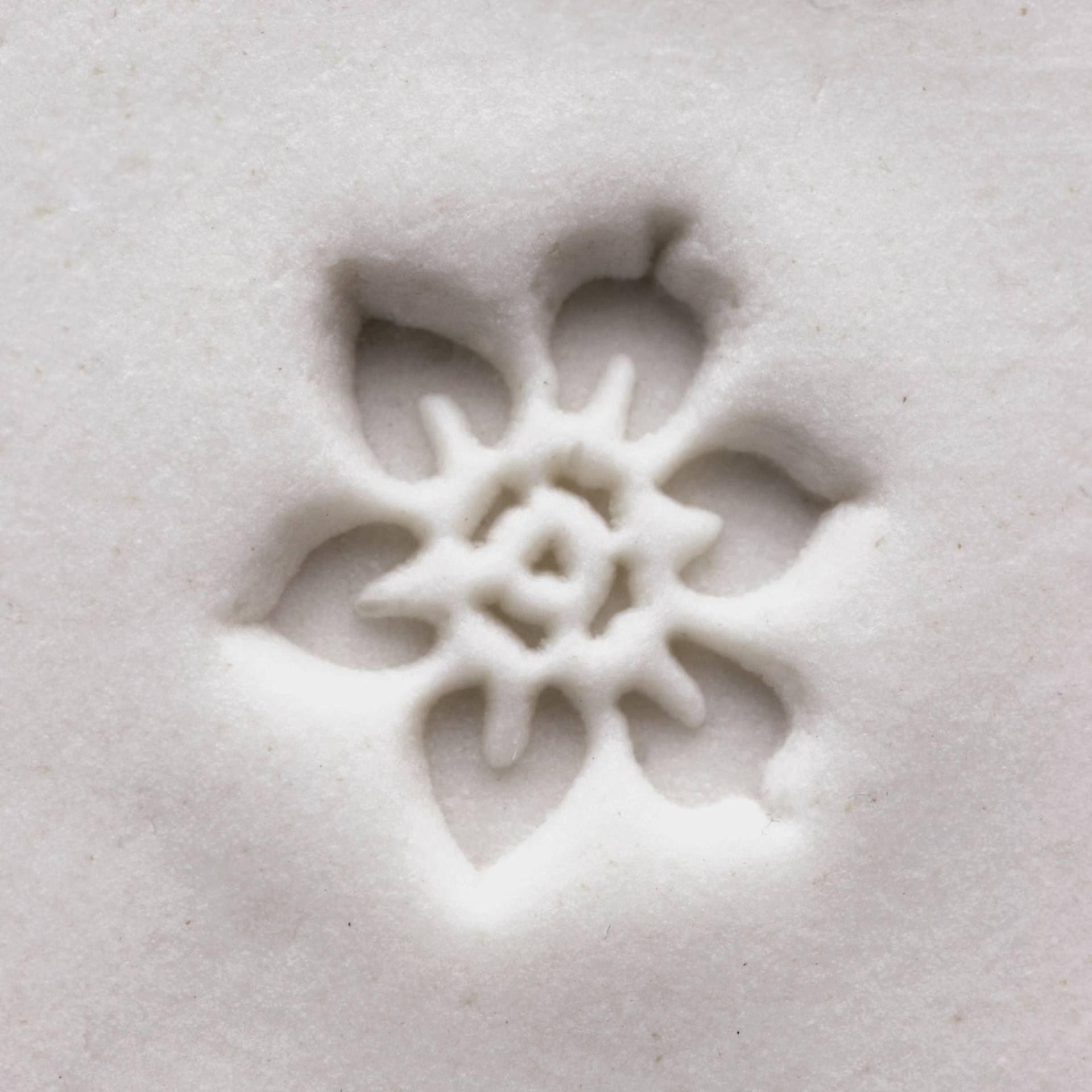 MKM Pottery Tools Small Round Stamp - SCS-045, Flower 1 applied to clay
