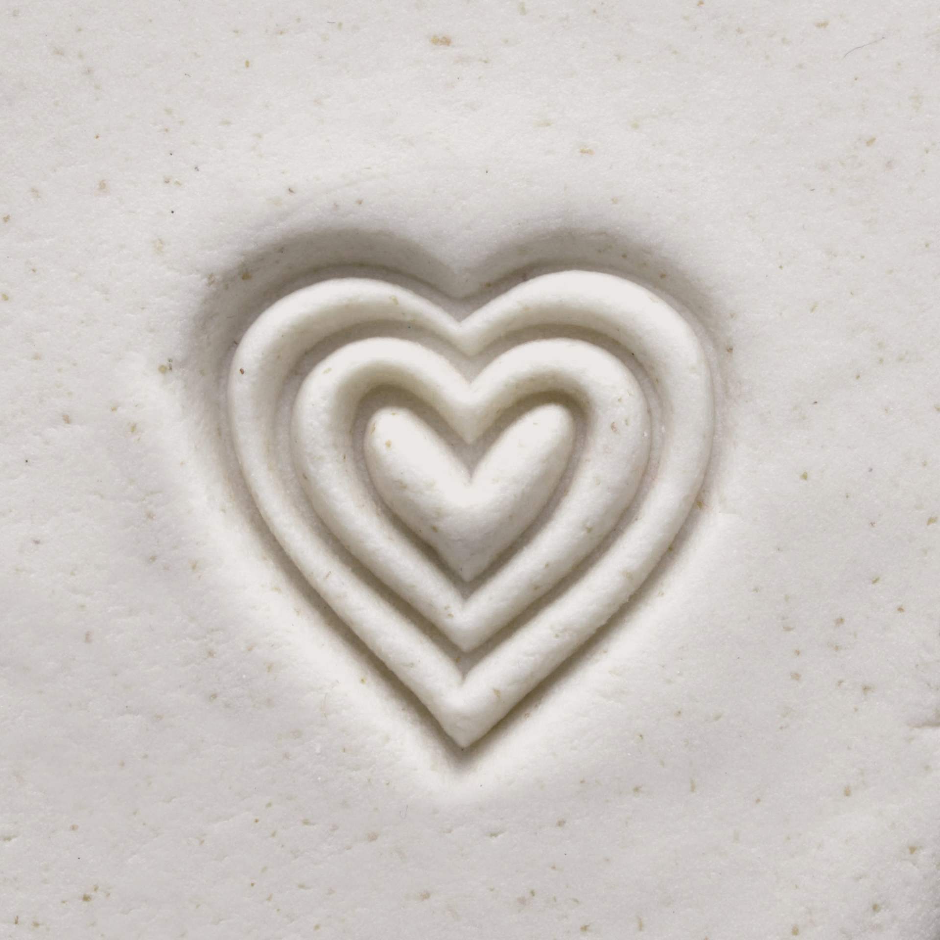 MKM Pottery Tools Medium Round Stamp - SCM-038, Triple Heart applied to clay