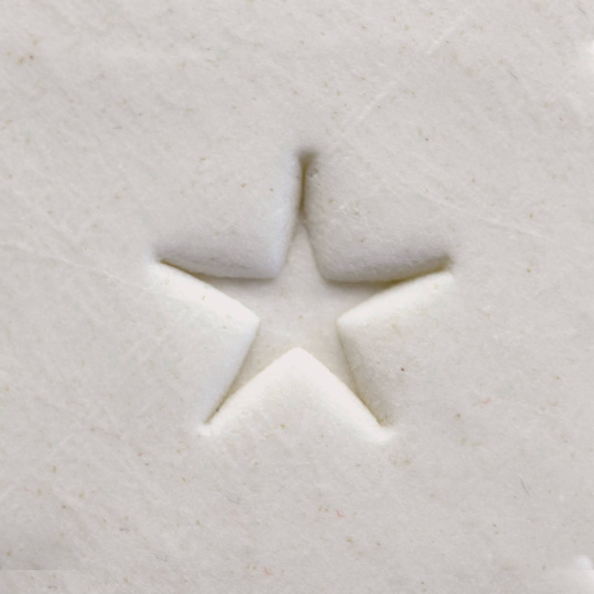 MKM Pottery Tools Small Round Stamp - SCS-084, Five-Point Star applied to clay