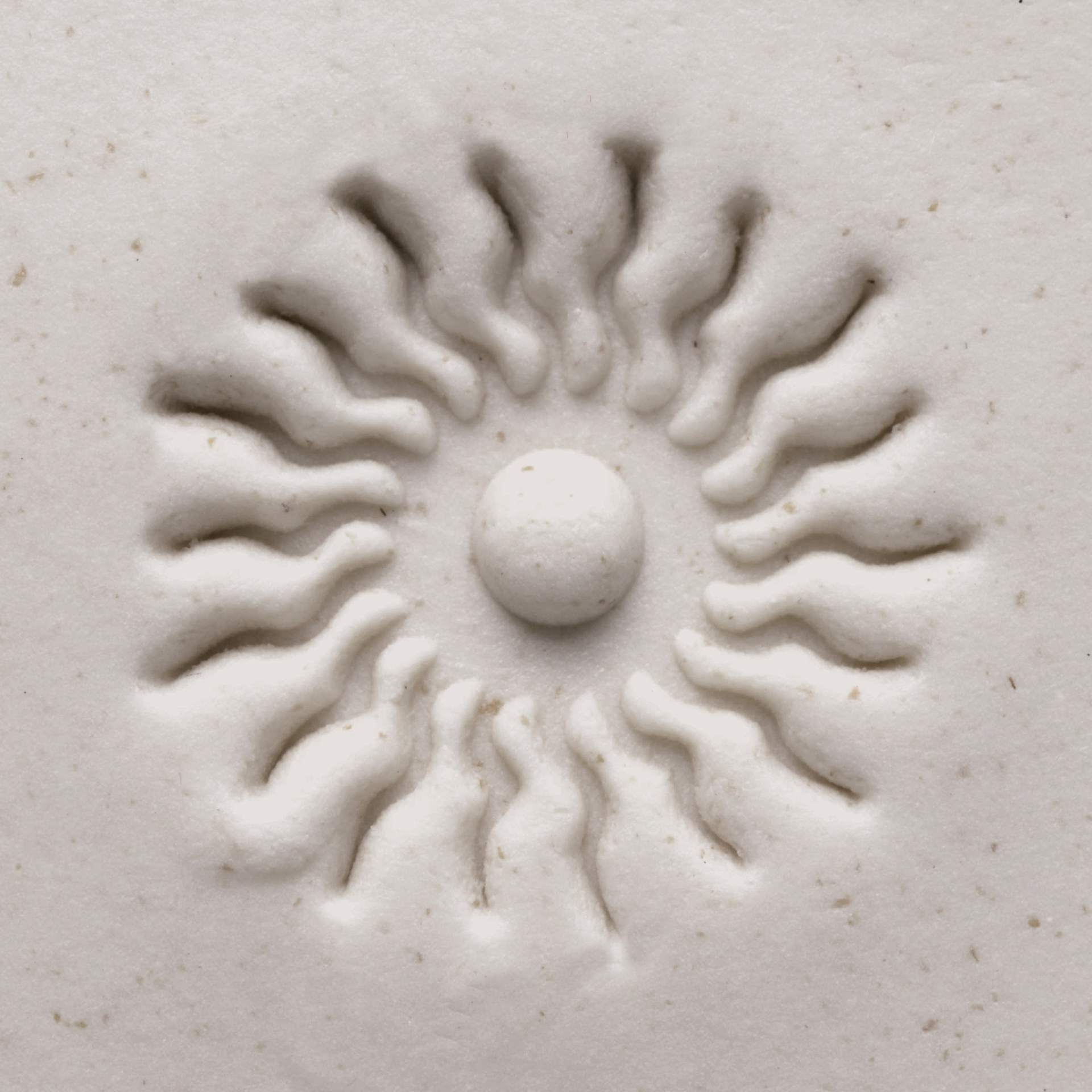 MKM Pottery Tools Medium Round Stamp - SCM-087, Aztec Sun applied to clay